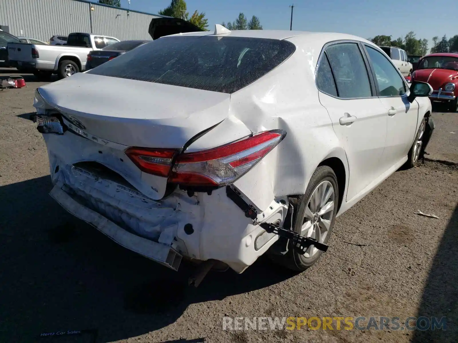 4 Photograph of a damaged car 4T1B11HK3KU239308 TOYOTA CAMRY 2019