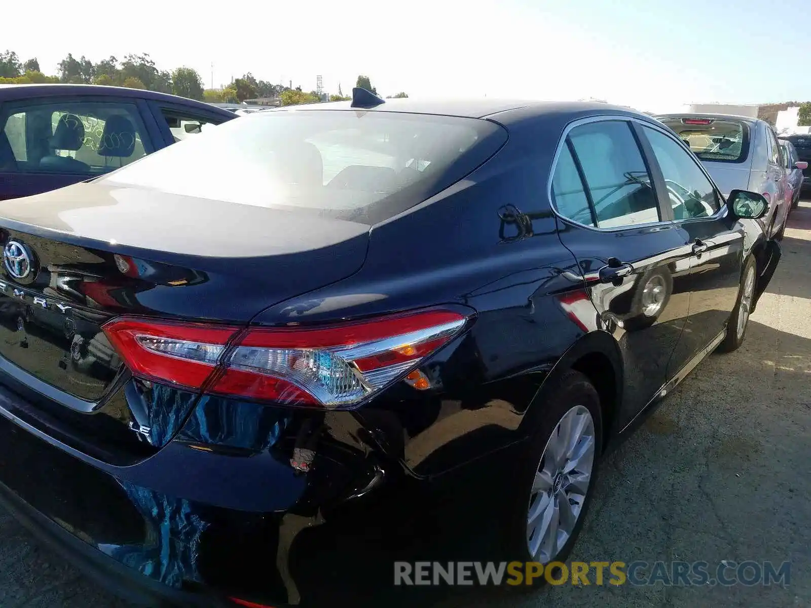 4 Photograph of a damaged car 4T1B11HK3KU241267 TOYOTA CAMRY 2019