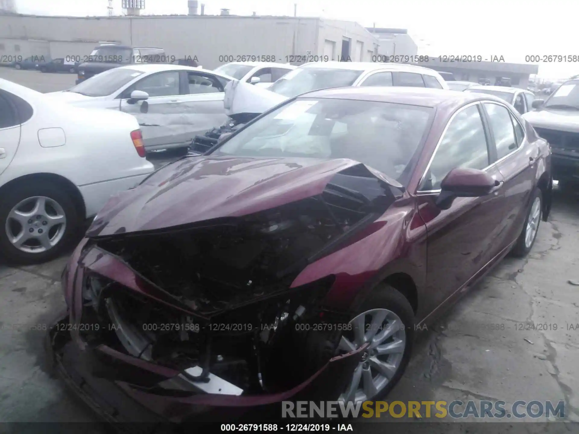 2 Photograph of a damaged car 4T1B11HK3KU241558 TOYOTA CAMRY 2019