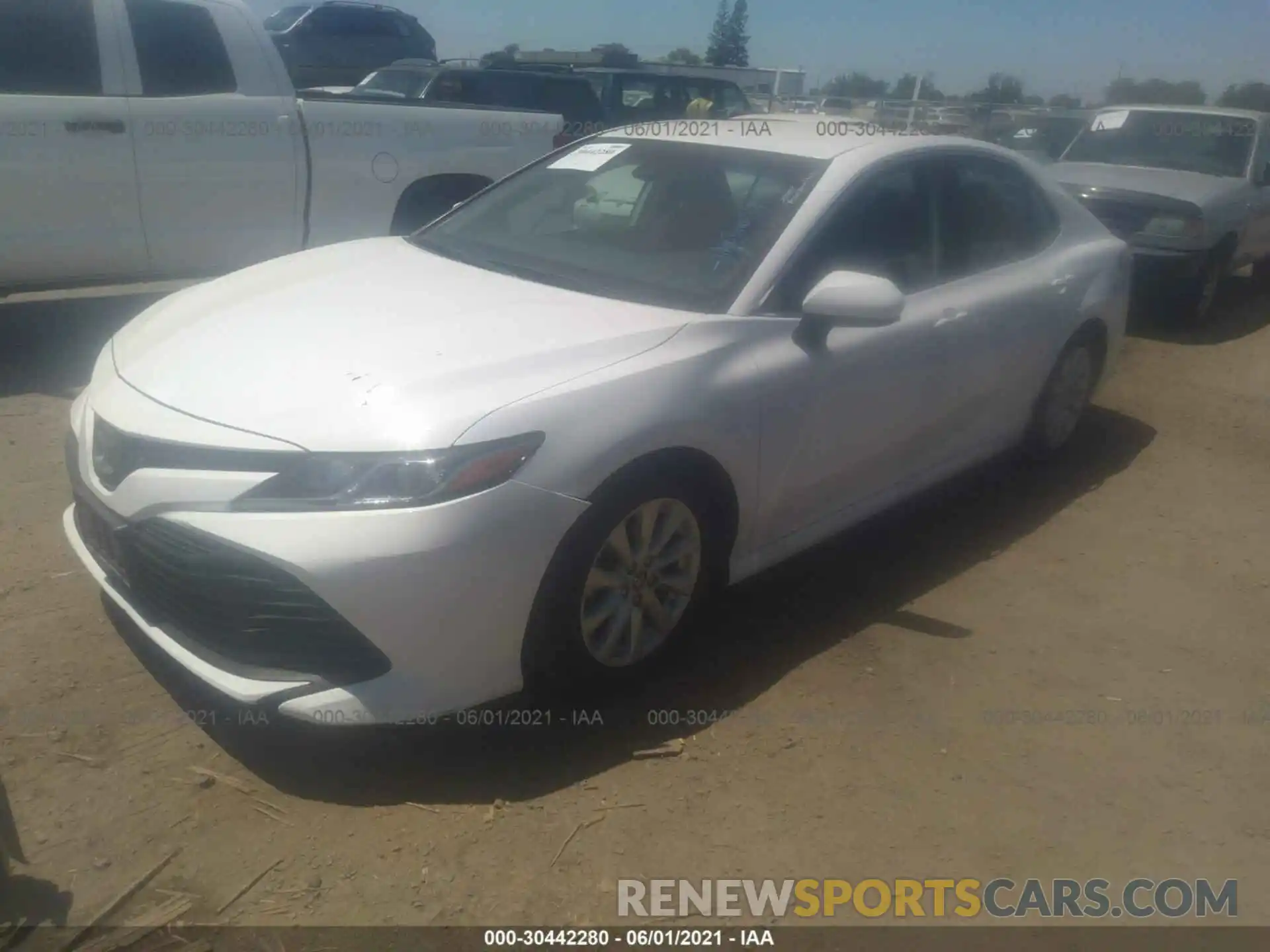 2 Photograph of a damaged car 4T1B11HK3KU242628 TOYOTA CAMRY 2019