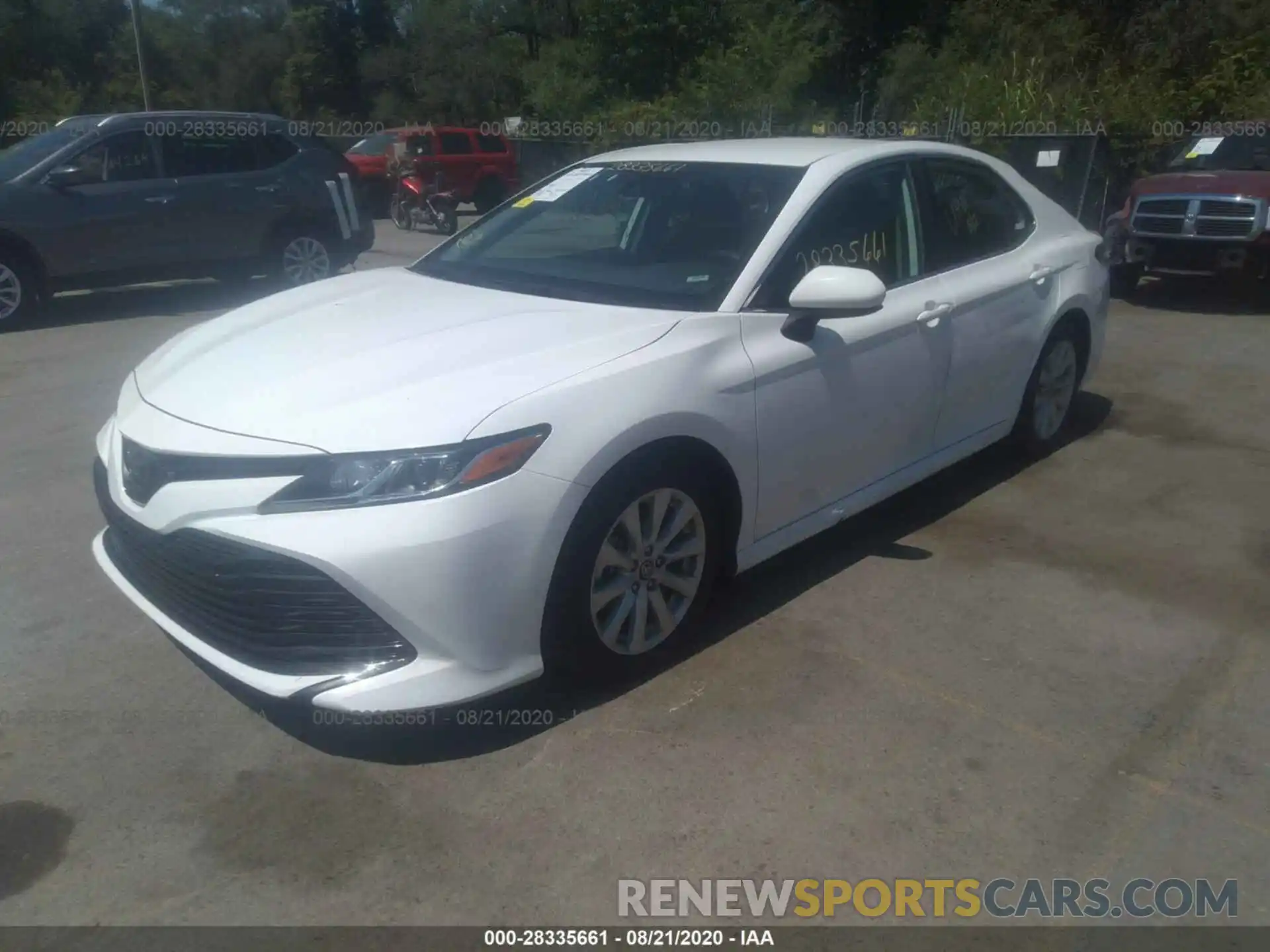 2 Photograph of a damaged car 4T1B11HK3KU242919 TOYOTA CAMRY 2019