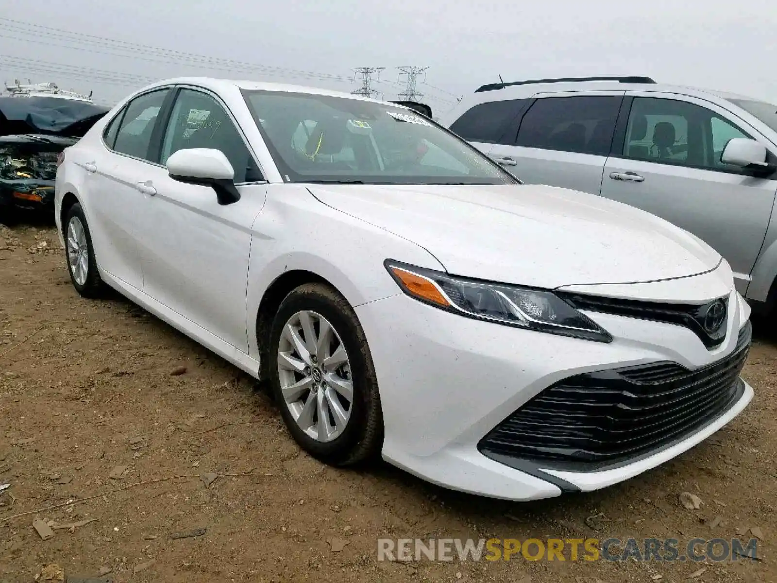 1 Photograph of a damaged car 4T1B11HK3KU243276 TOYOTA CAMRY 2019