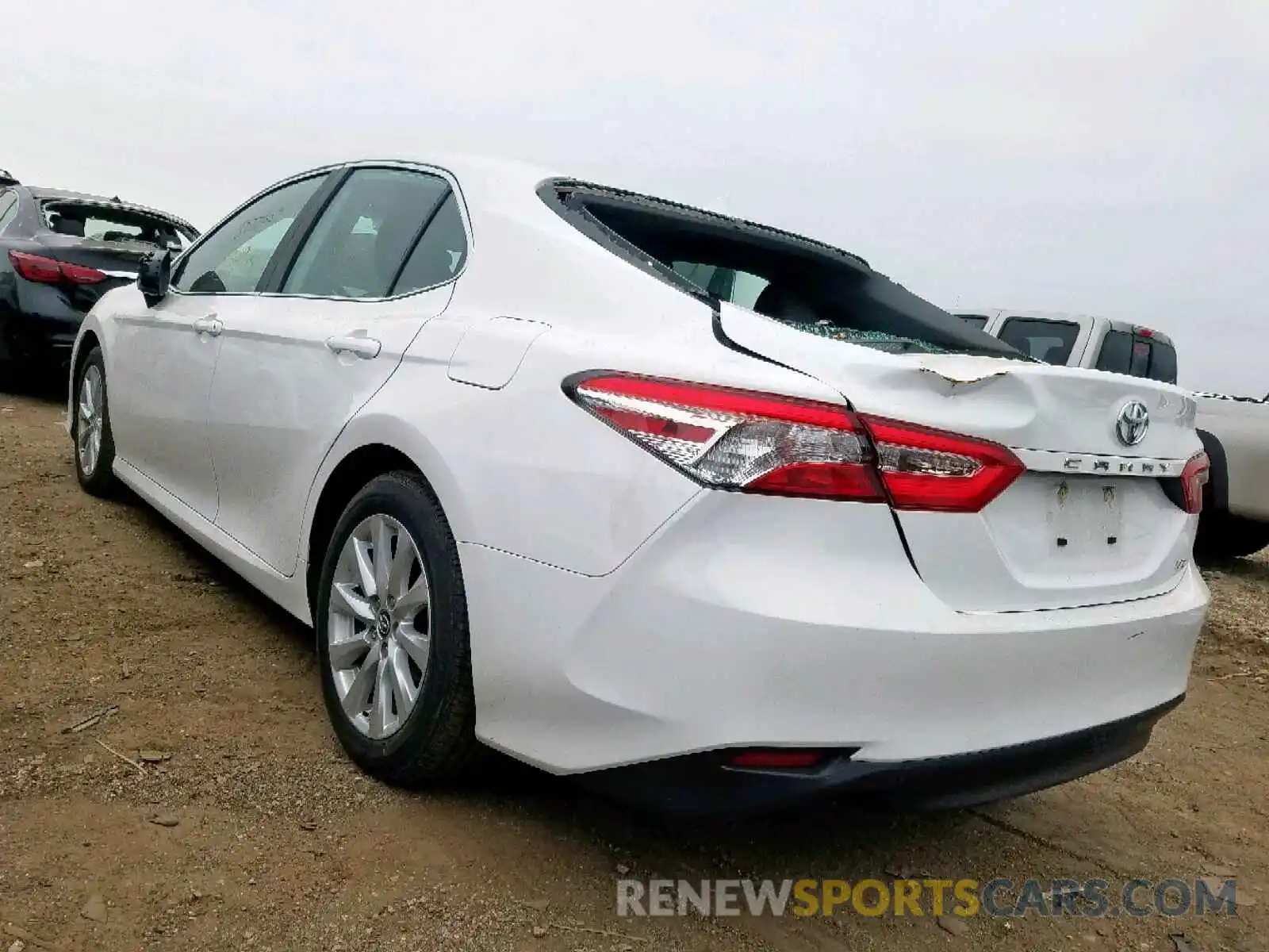 3 Photograph of a damaged car 4T1B11HK3KU243276 TOYOTA CAMRY 2019