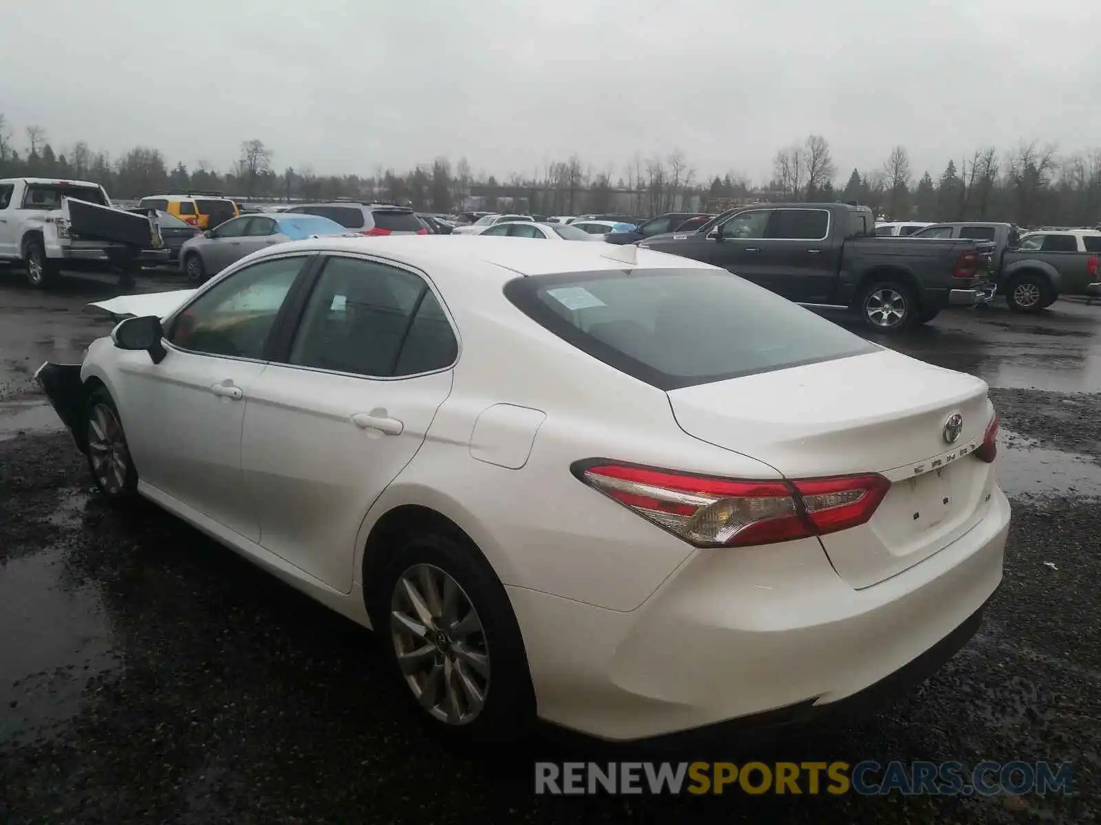 3 Photograph of a damaged car 4T1B11HK3KU243651 TOYOTA CAMRY 2019