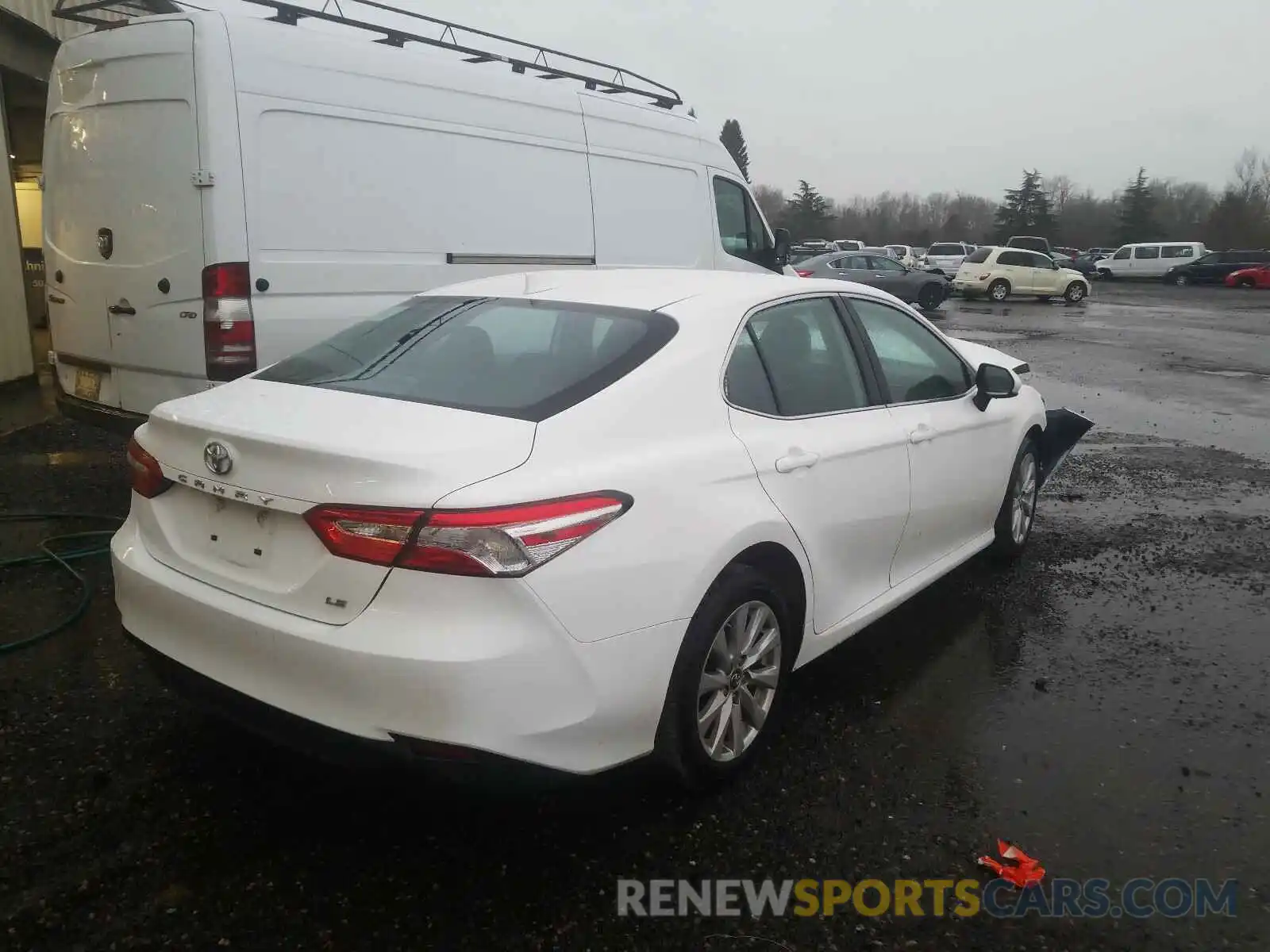 4 Photograph of a damaged car 4T1B11HK3KU243651 TOYOTA CAMRY 2019