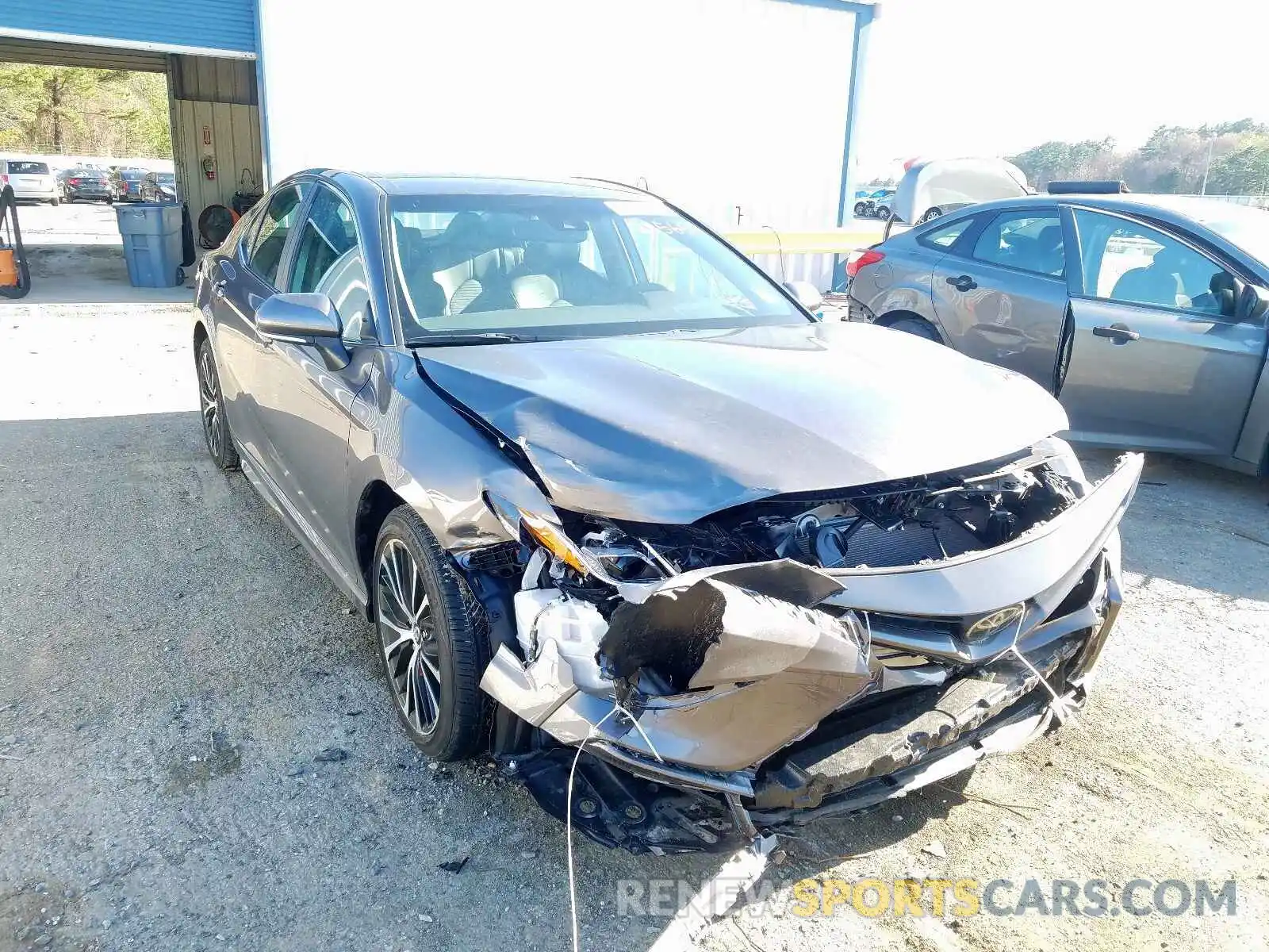 1 Photograph of a damaged car 4T1B11HK3KU245657 TOYOTA CAMRY 2019