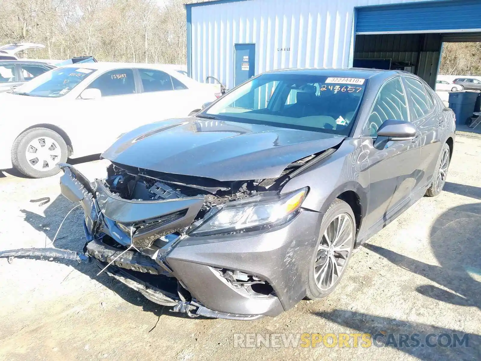 2 Photograph of a damaged car 4T1B11HK3KU245657 TOYOTA CAMRY 2019