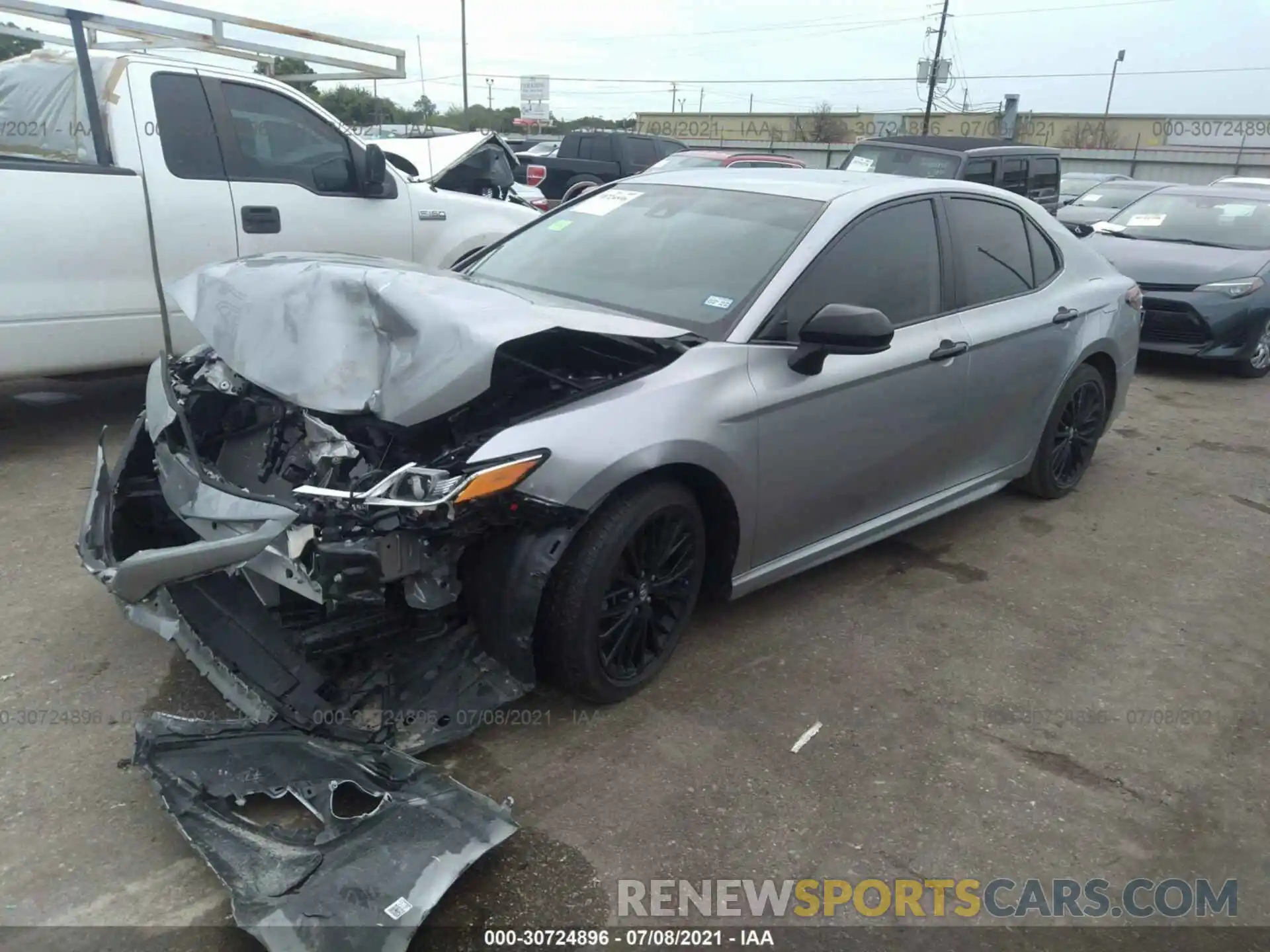 2 Photograph of a damaged car 4T1B11HK3KU247103 TOYOTA CAMRY 2019