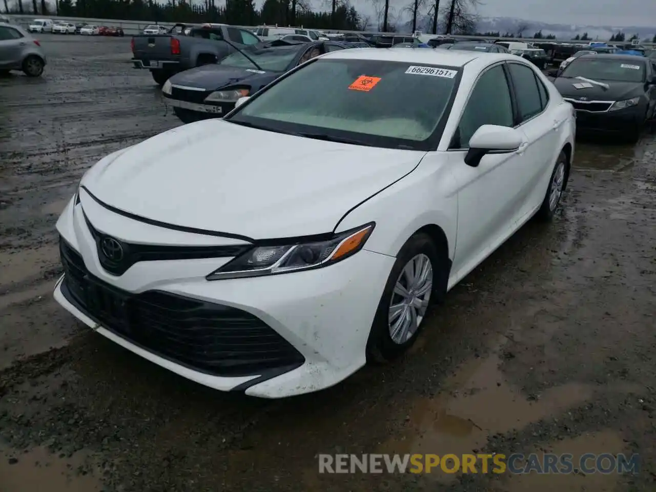 2 Photograph of a damaged car 4T1B11HK3KU249109 TOYOTA CAMRY 2019