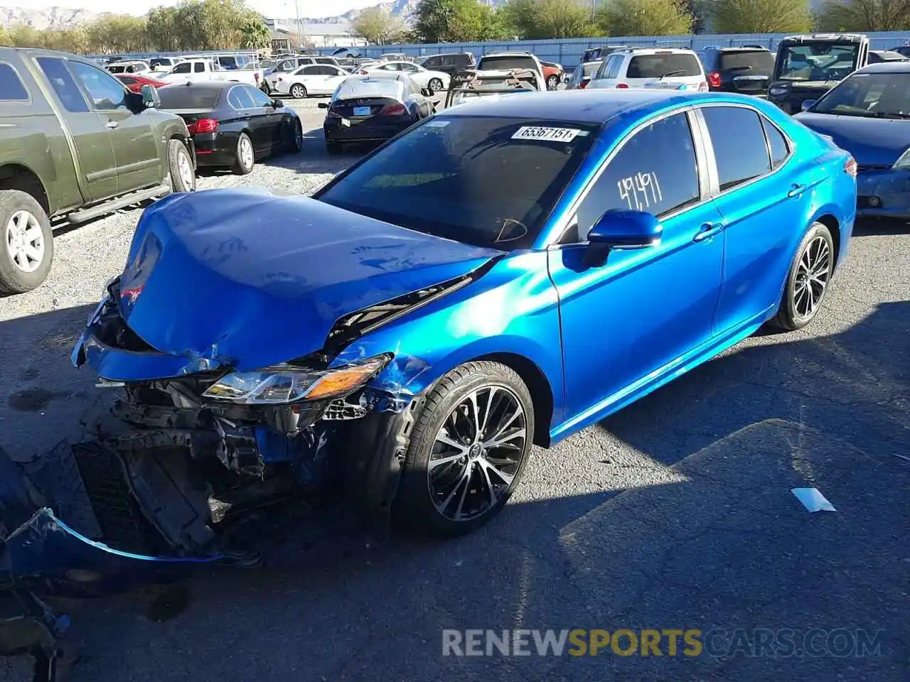 2 Photograph of a damaged car 4T1B11HK3KU258604 TOYOTA CAMRY 2019