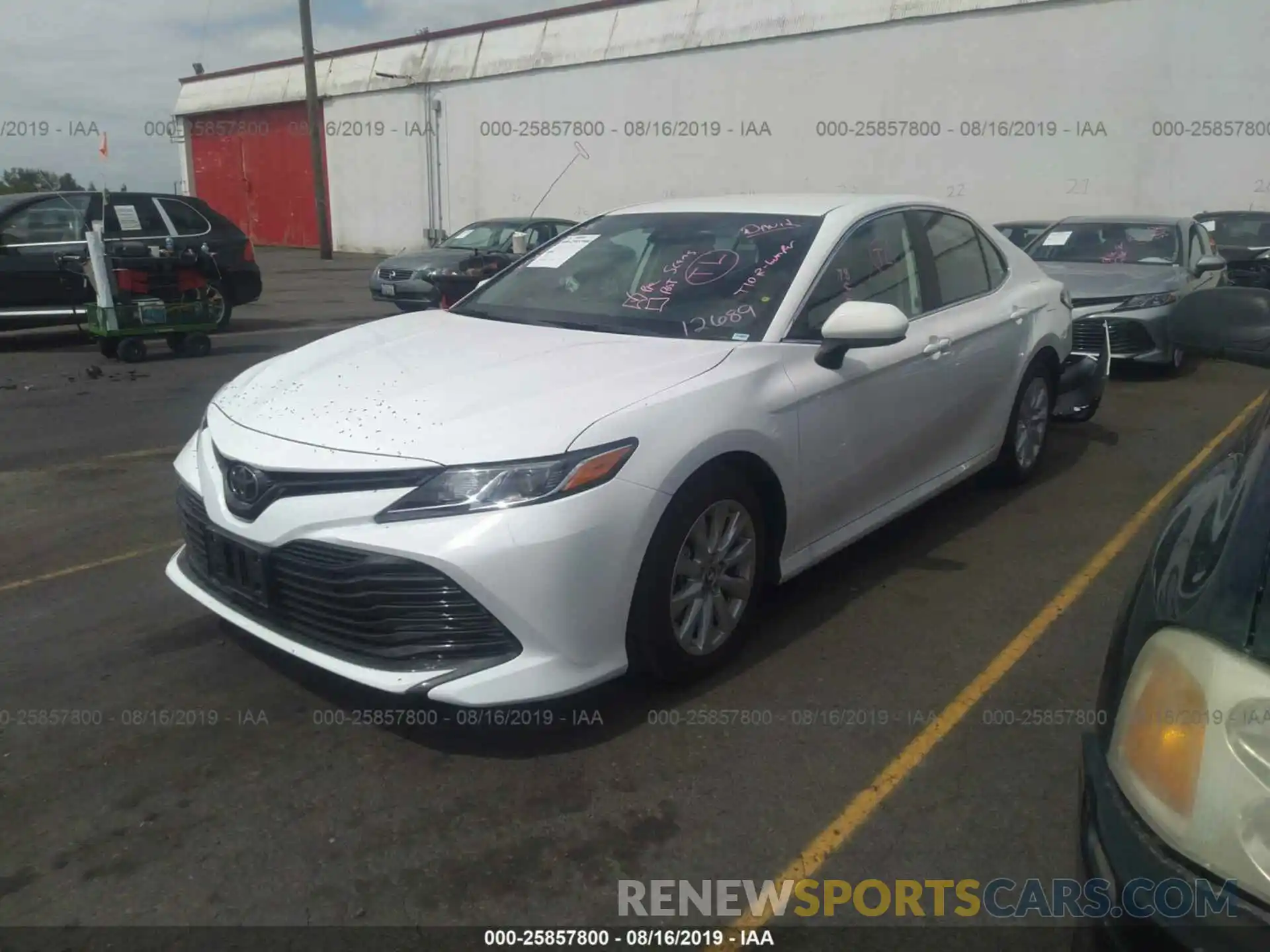 2 Photograph of a damaged car 4T1B11HK3KU261275 TOYOTA CAMRY 2019