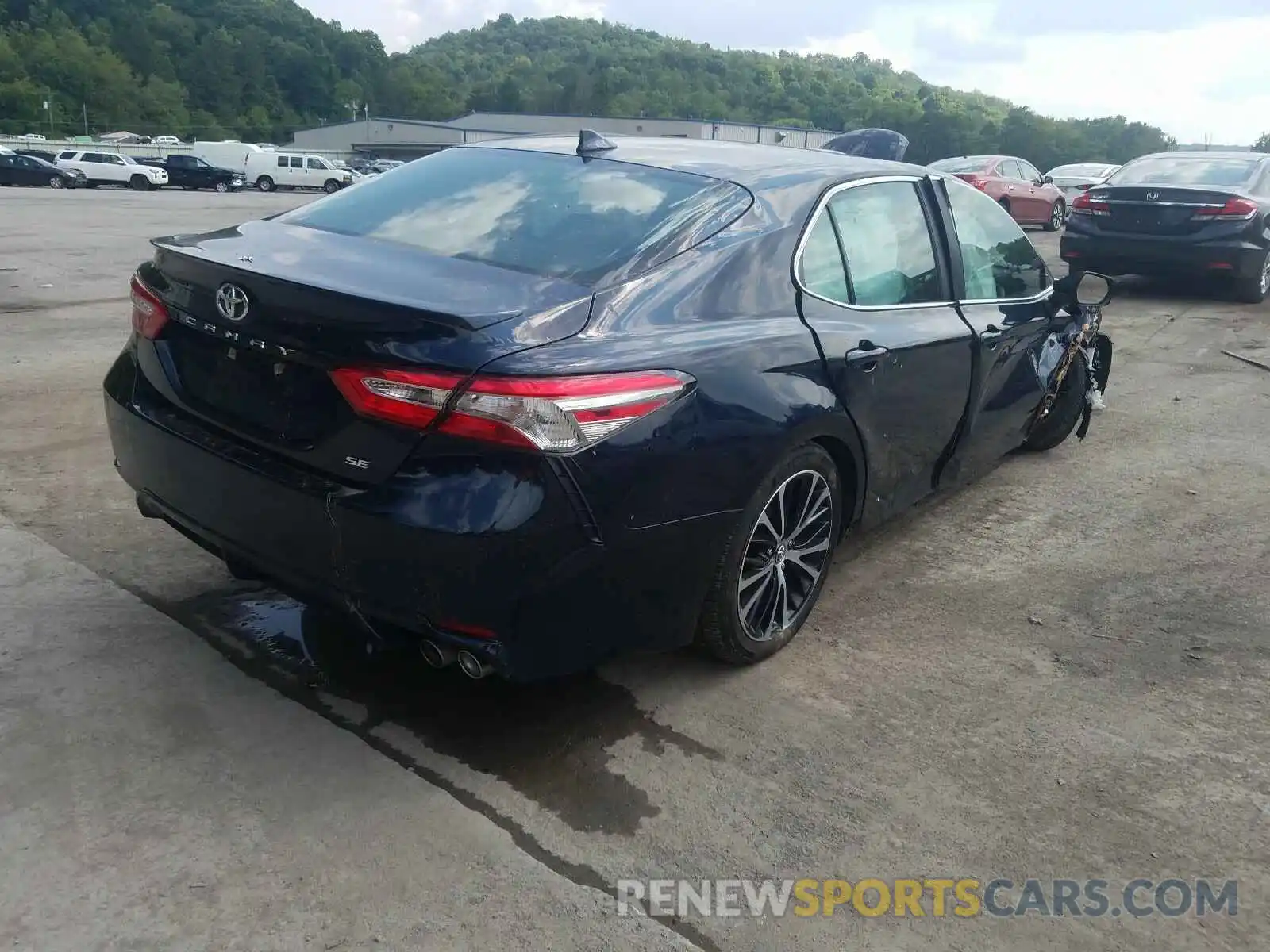 4 Photograph of a damaged car 4T1B11HK3KU261843 TOYOTA CAMRY 2019