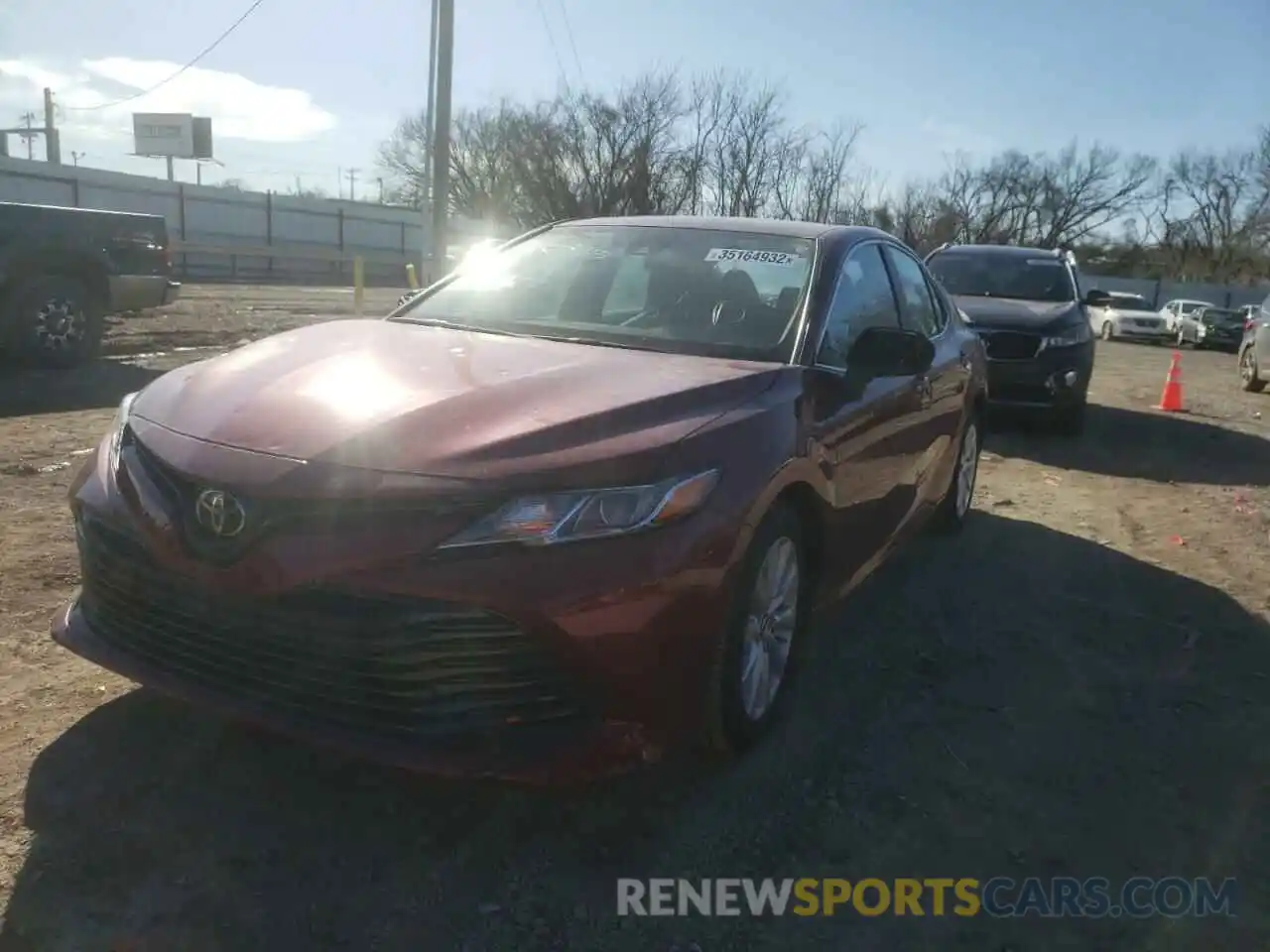 2 Photograph of a damaged car 4T1B11HK3KU266573 TOYOTA CAMRY 2019