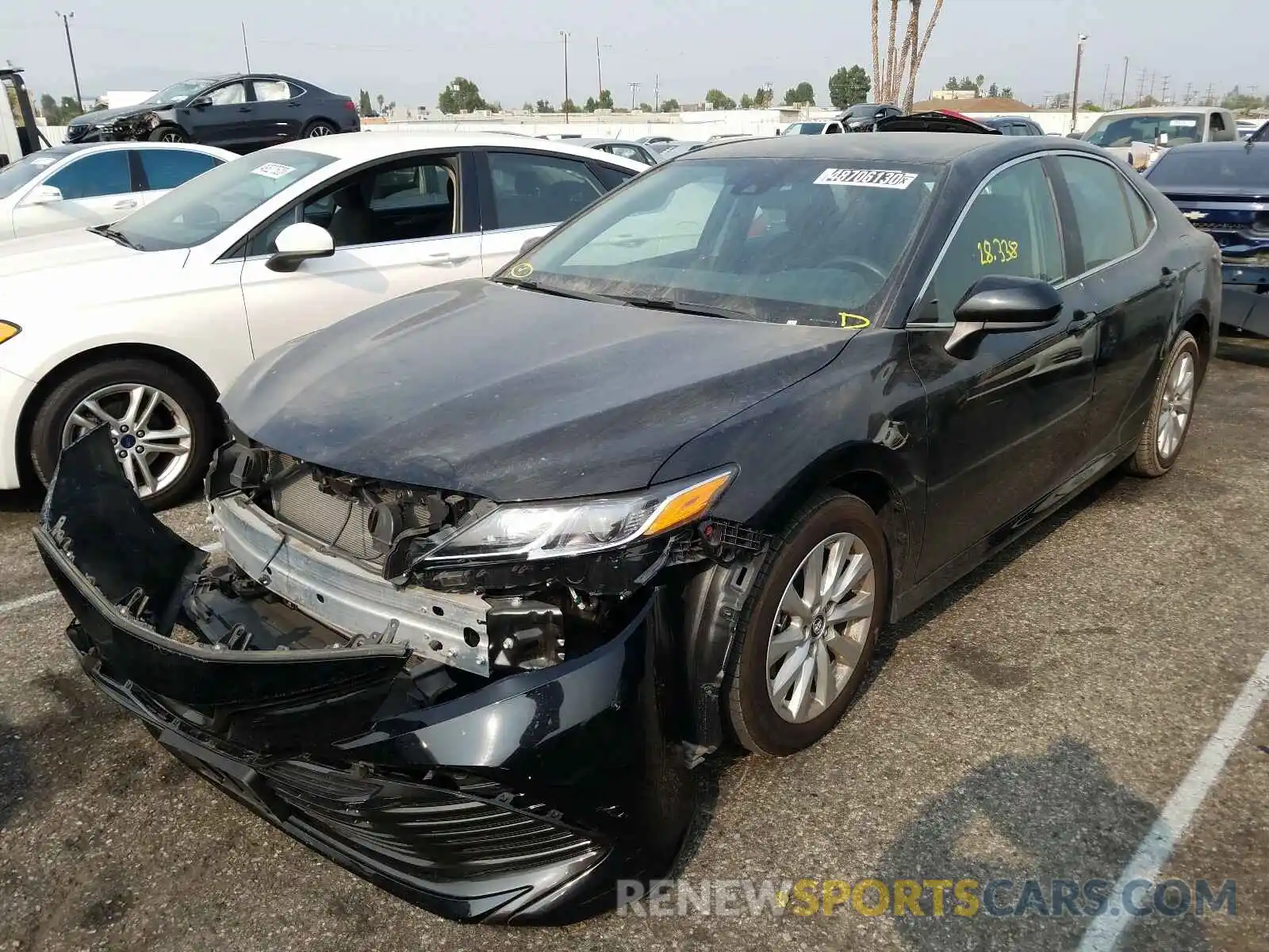 2 Photograph of a damaged car 4T1B11HK3KU268906 TOYOTA CAMRY 2019