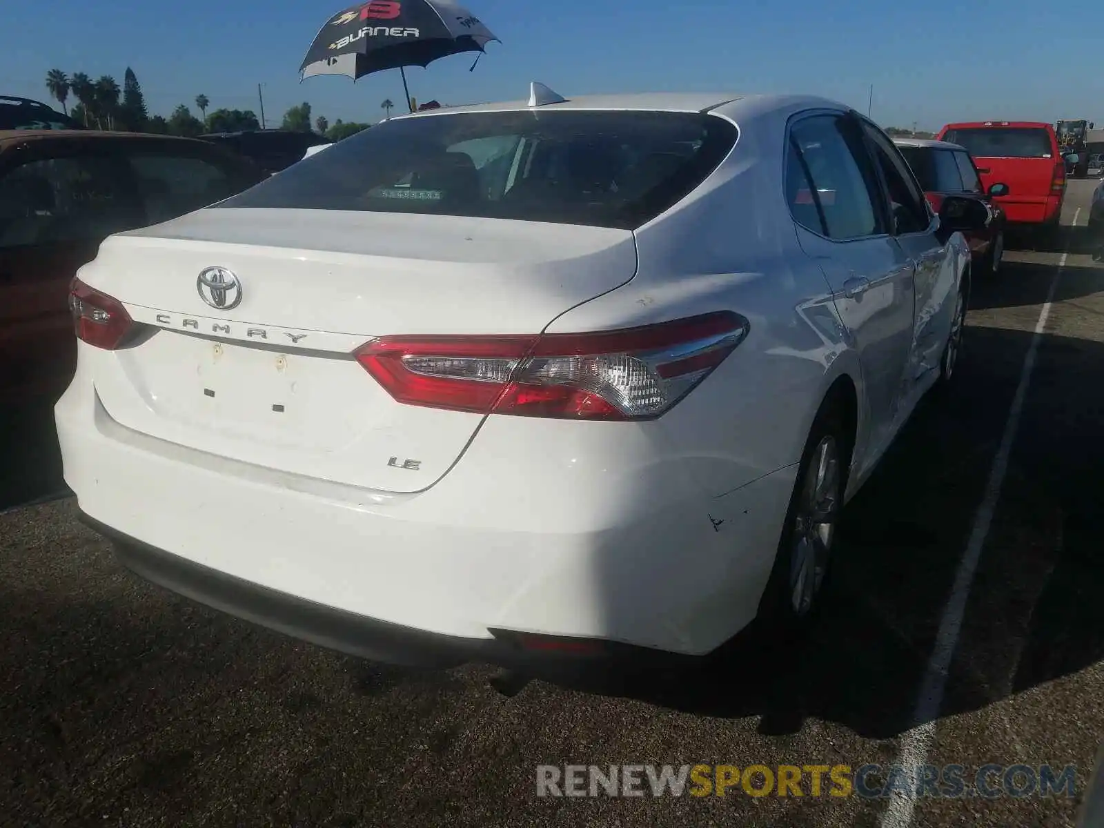 4 Photograph of a damaged car 4T1B11HK3KU270980 TOYOTA CAMRY 2019