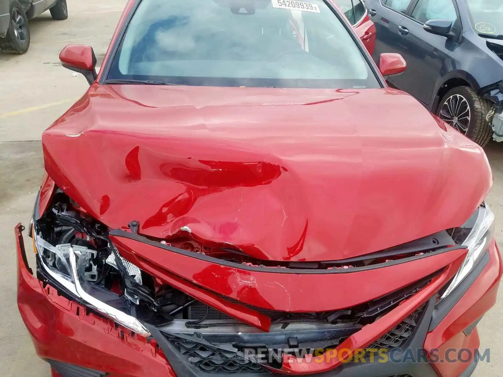 7 Photograph of a damaged car 4T1B11HK3KU282031 TOYOTA CAMRY 2019