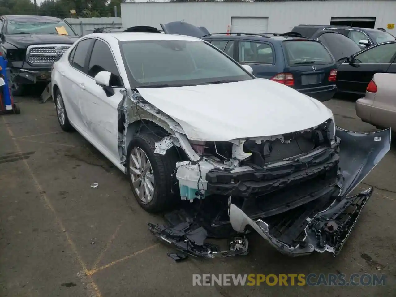 1 Photograph of a damaged car 4T1B11HK3KU285608 TOYOTA CAMRY 2019