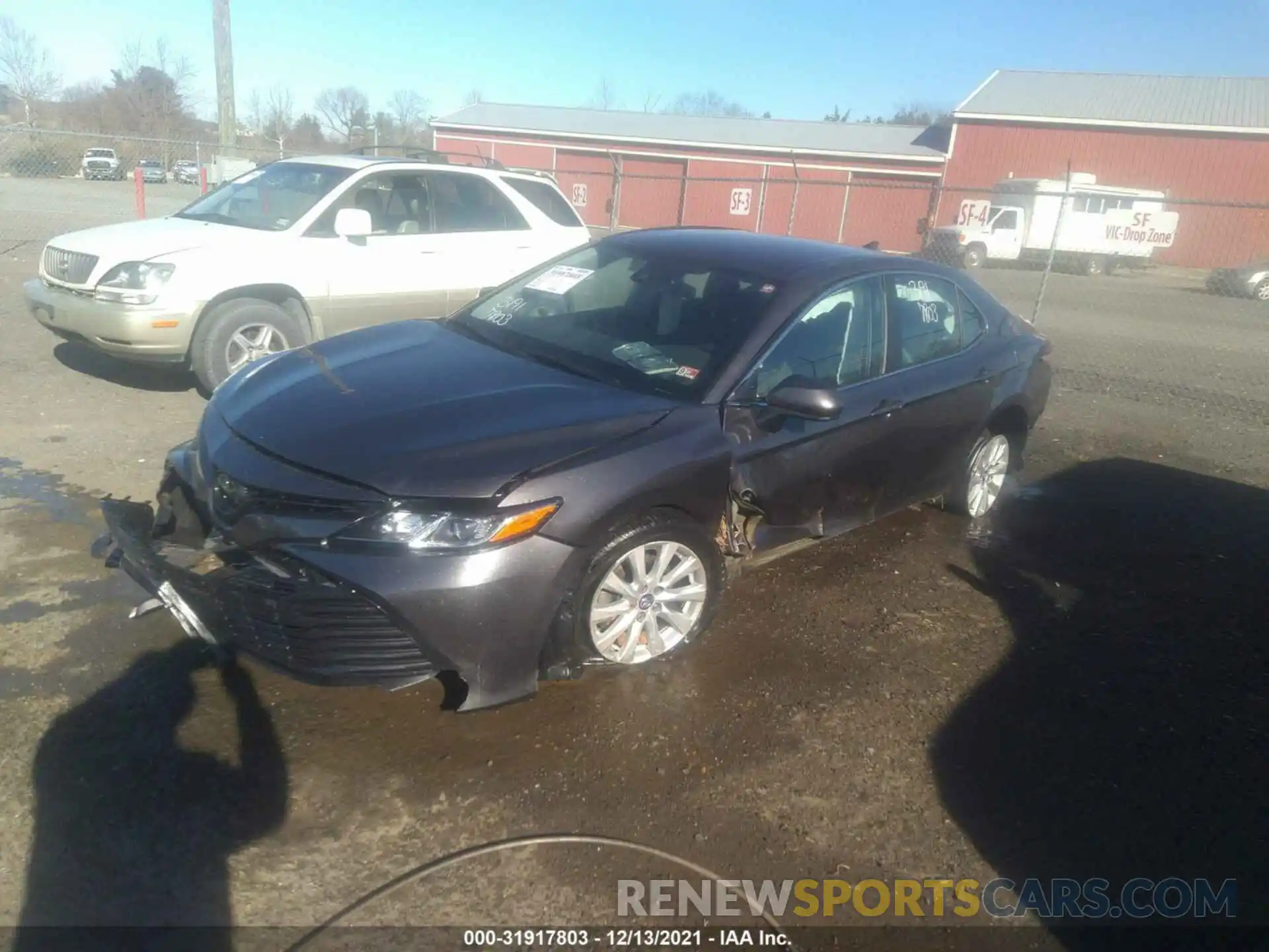 2 Photograph of a damaged car 4T1B11HK3KU286418 TOYOTA CAMRY 2019