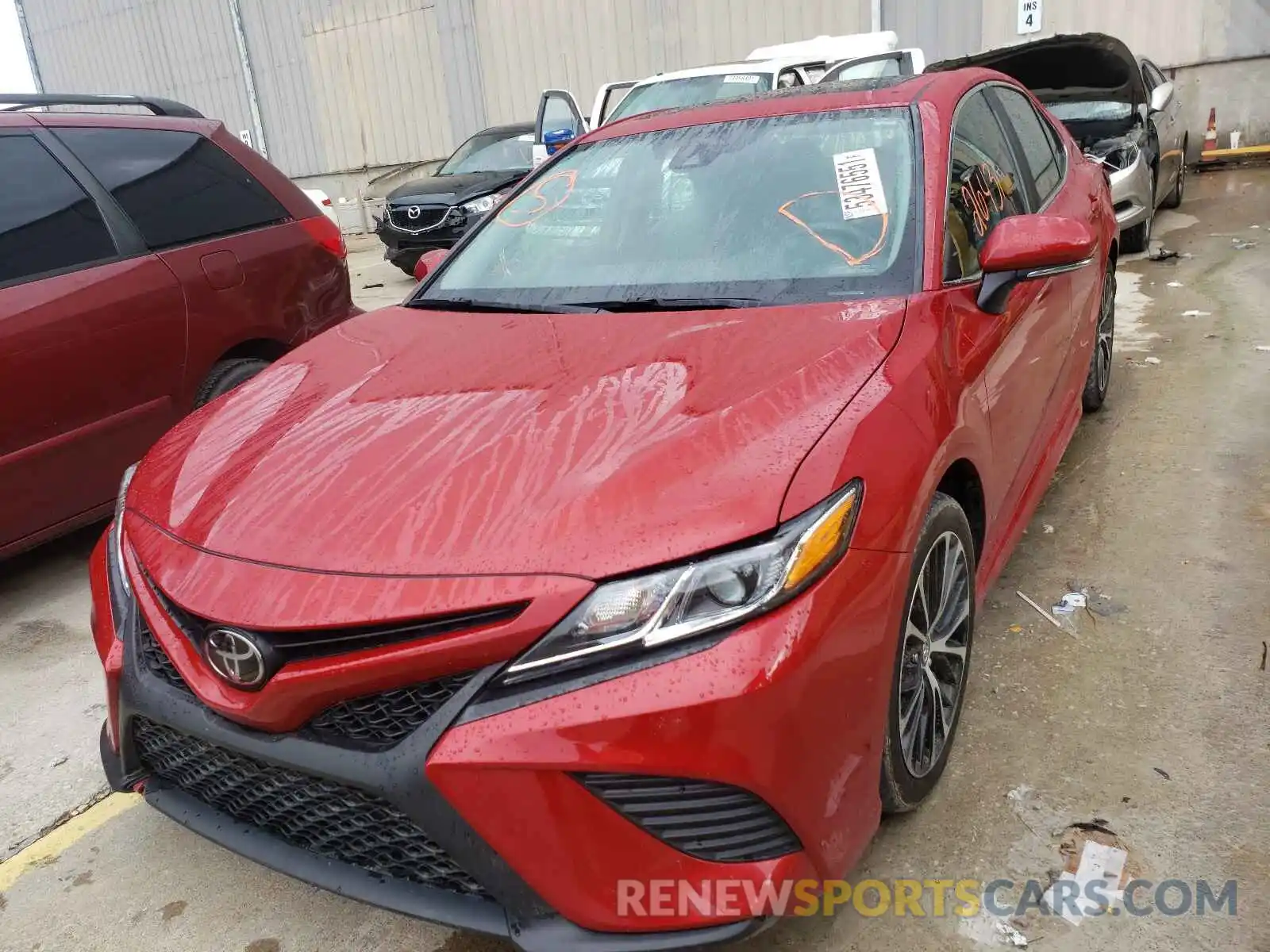 2 Photograph of a damaged car 4T1B11HK3KU288217 TOYOTA CAMRY 2019