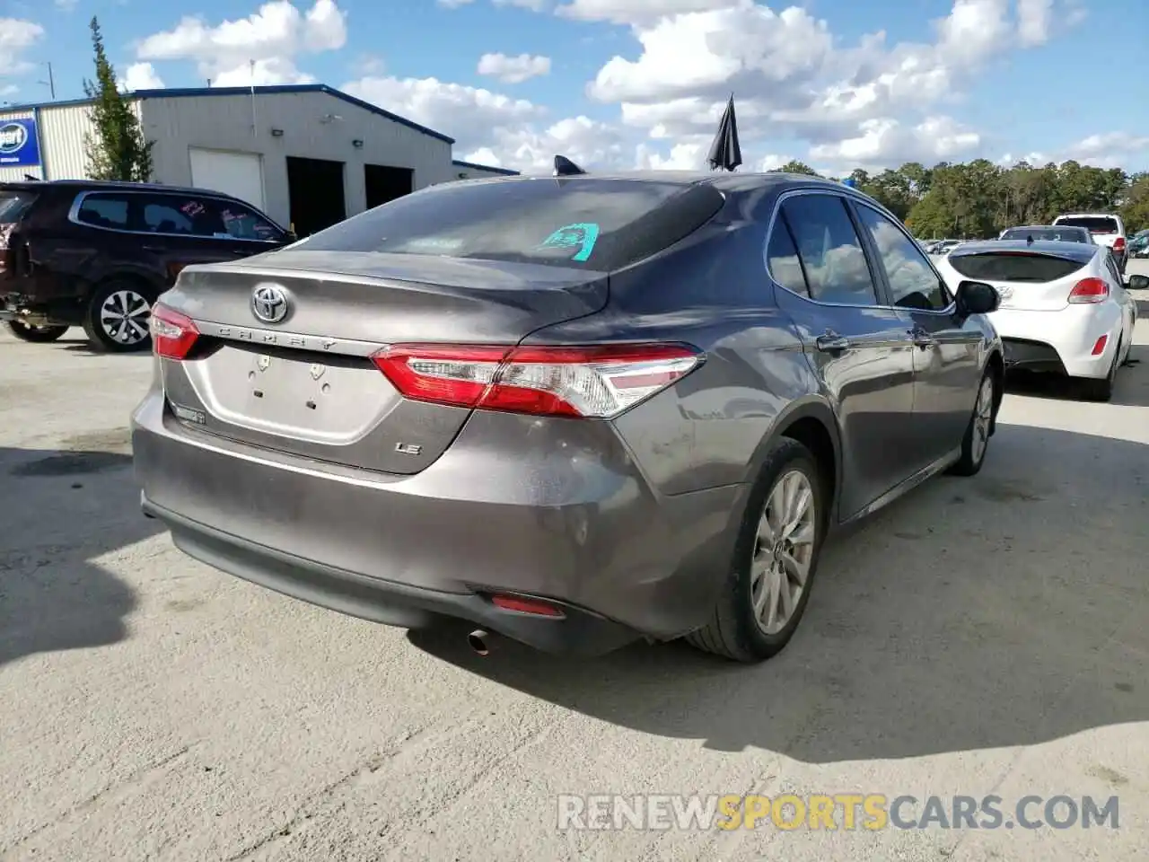 4 Photograph of a damaged car 4T1B11HK3KU289240 TOYOTA CAMRY 2019