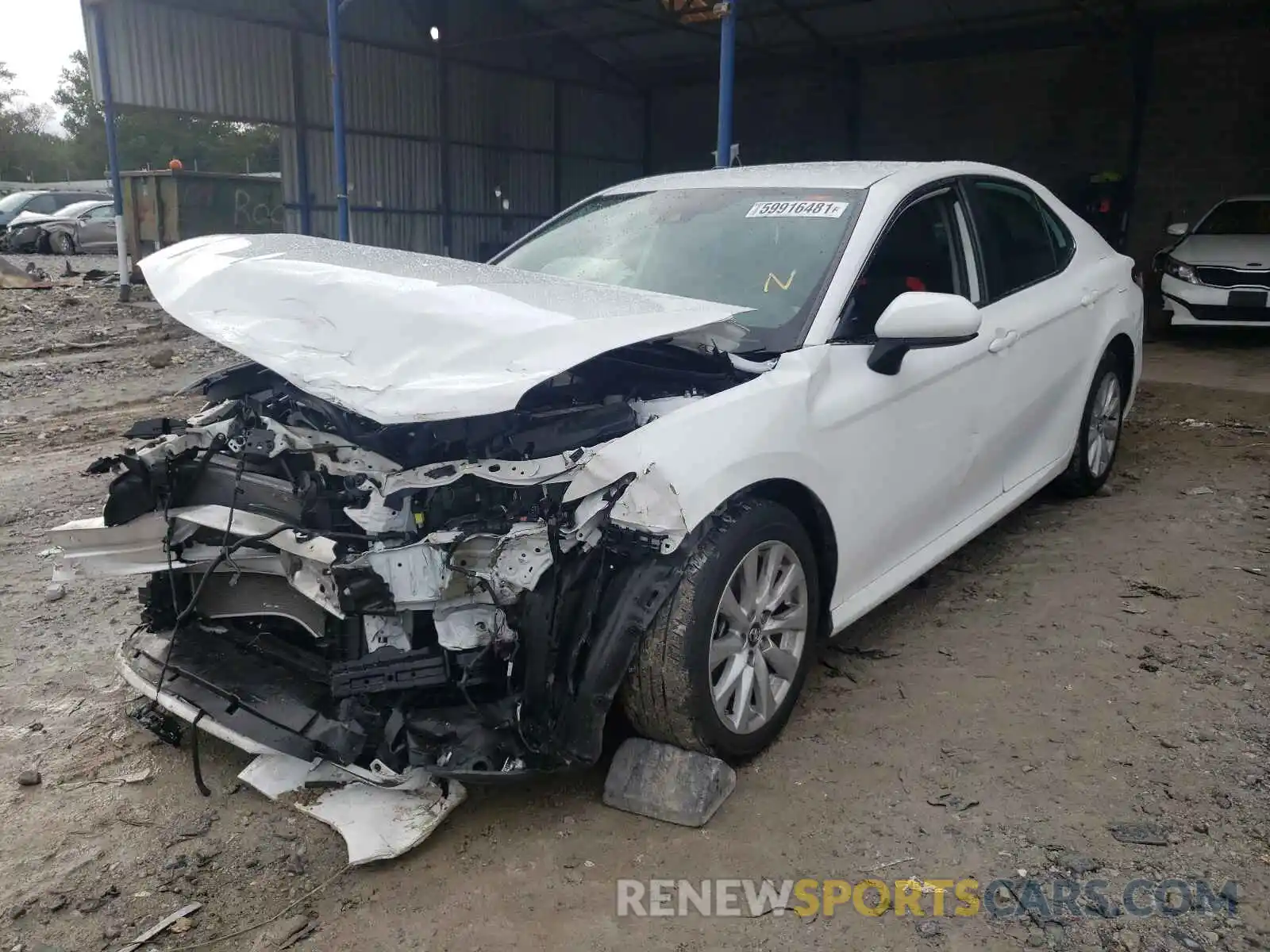 2 Photograph of a damaged car 4T1B11HK3KU290386 TOYOTA CAMRY 2019