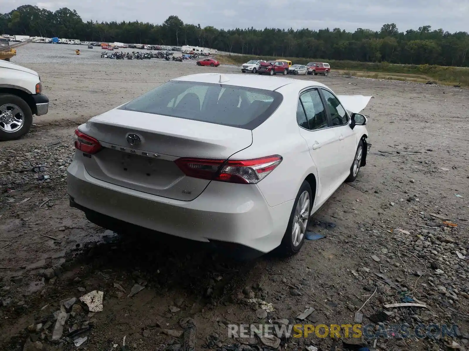 4 Photograph of a damaged car 4T1B11HK3KU290386 TOYOTA CAMRY 2019