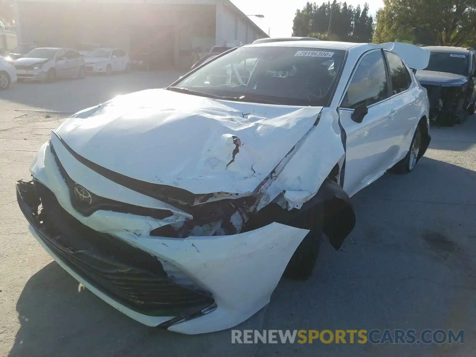 2 Photograph of a damaged car 4T1B11HK3KU290744 TOYOTA CAMRY 2019