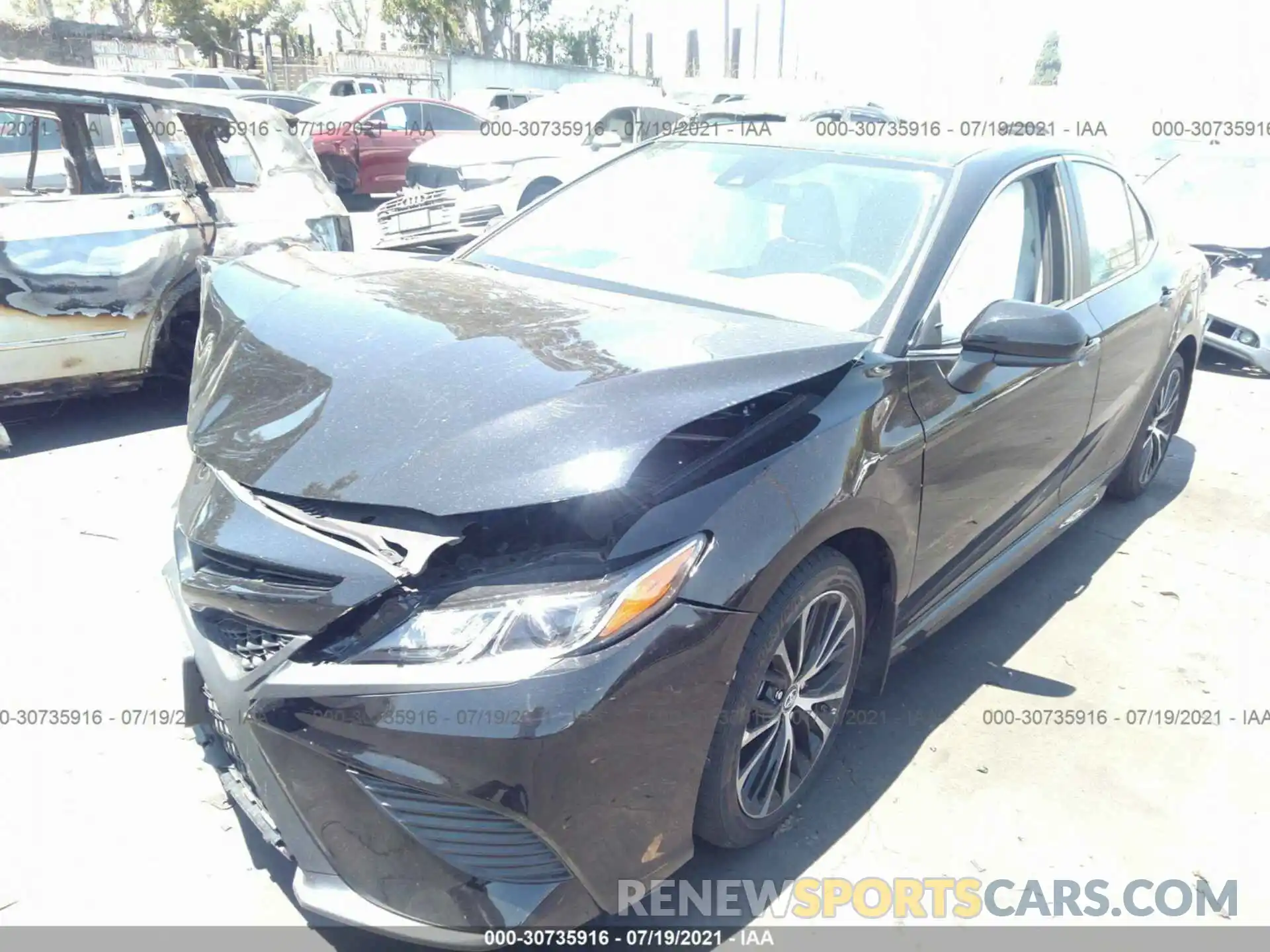 2 Photograph of a damaged car 4T1B11HK3KU297483 TOYOTA CAMRY 2019