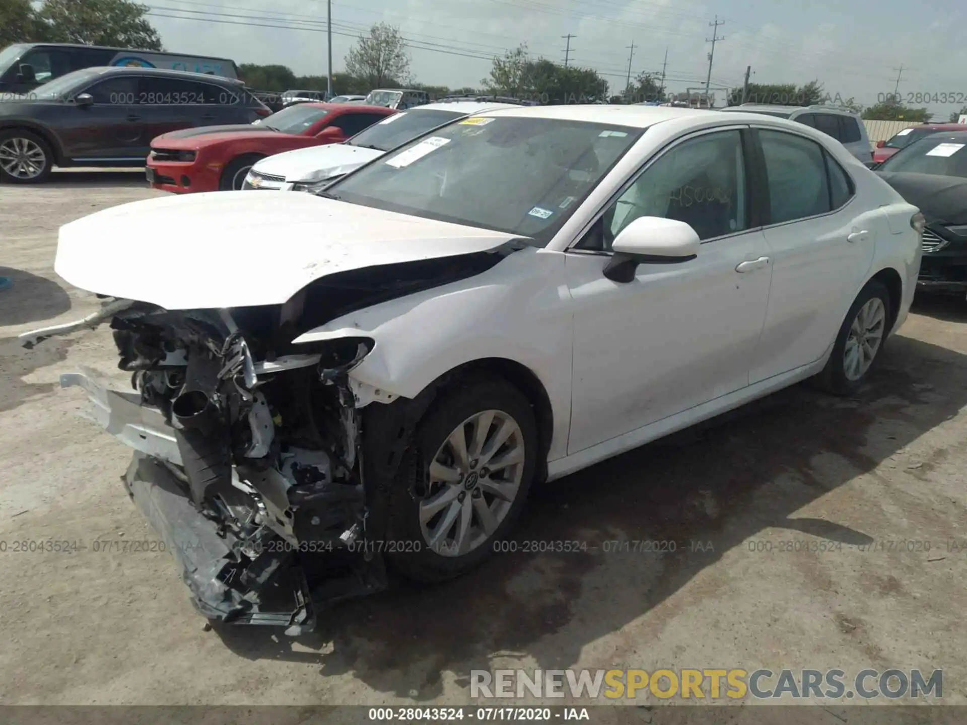 2 Photograph of a damaged car 4T1B11HK3KU679500 TOYOTA CAMRY 2019