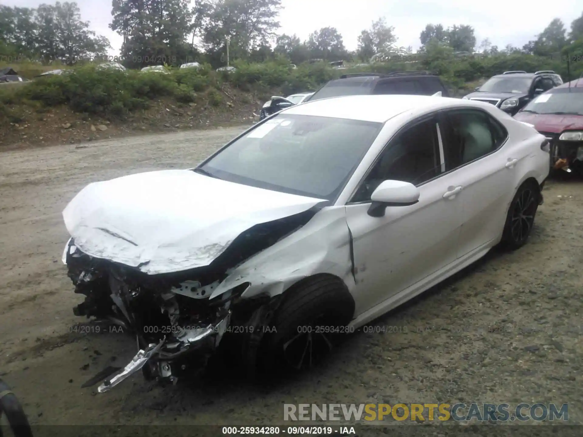 2 Photograph of a damaged car 4T1B11HK3KU680968 TOYOTA CAMRY 2019