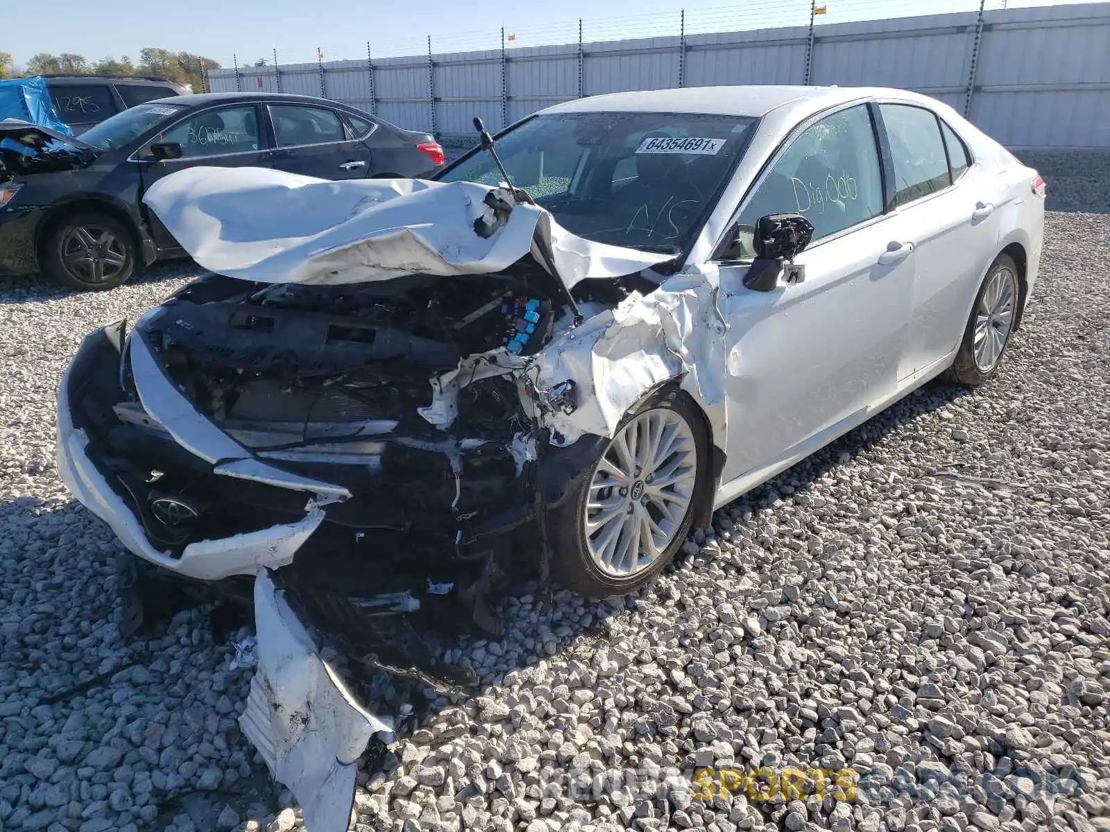 2 Photograph of a damaged car 4T1B11HK3KU682879 TOYOTA CAMRY 2019