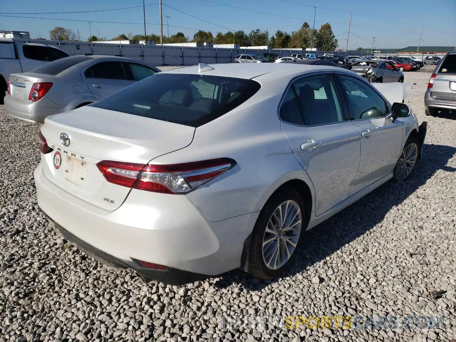 4 Photograph of a damaged car 4T1B11HK3KU682879 TOYOTA CAMRY 2019