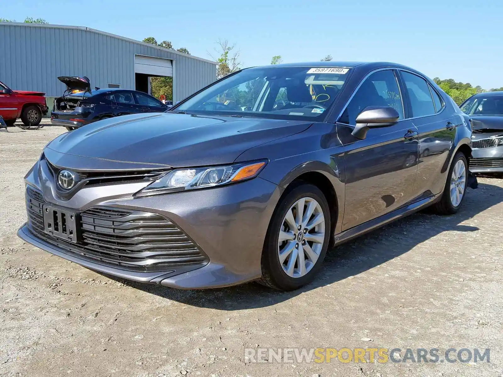 2 Photograph of a damaged car 4T1B11HK3KU687628 TOYOTA CAMRY 2019