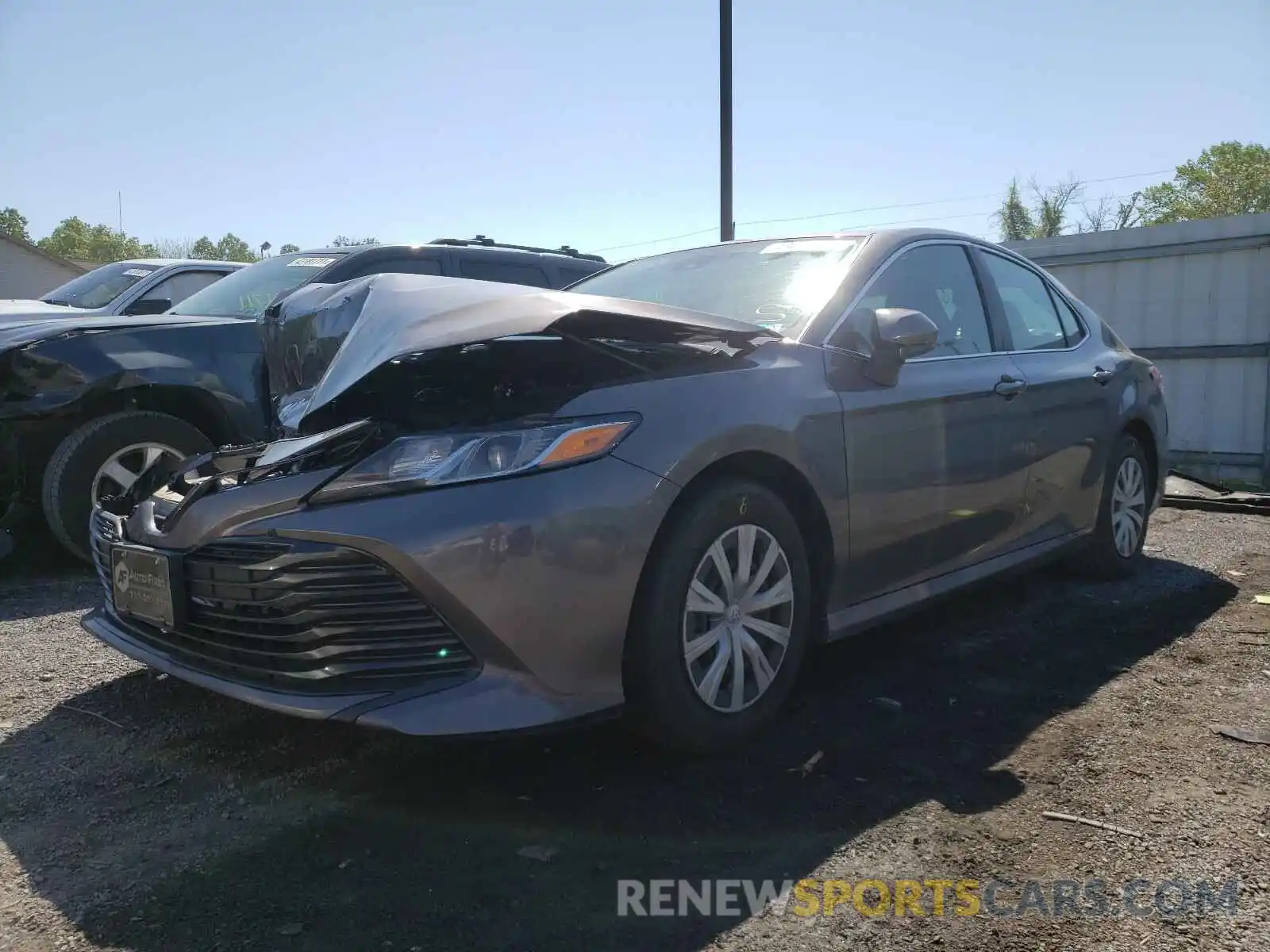 2 Photograph of a damaged car 4T1B11HK3KU687824 TOYOTA CAMRY 2019