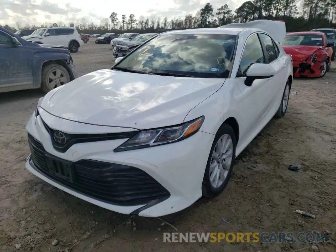 2 Photograph of a damaged car 4T1B11HK3KU687919 TOYOTA CAMRY 2019