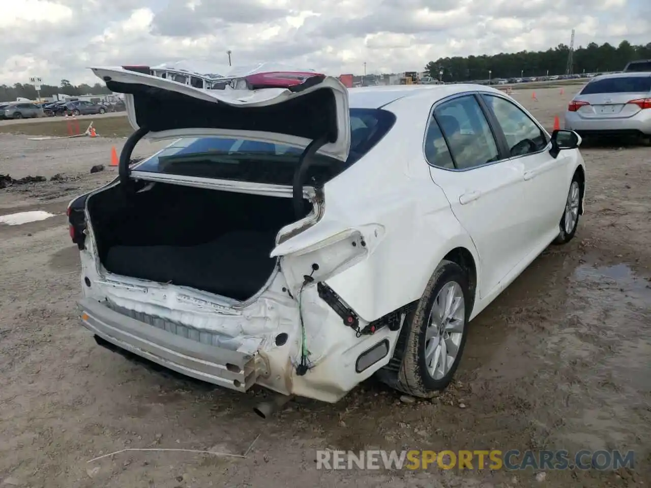 4 Photograph of a damaged car 4T1B11HK3KU687919 TOYOTA CAMRY 2019