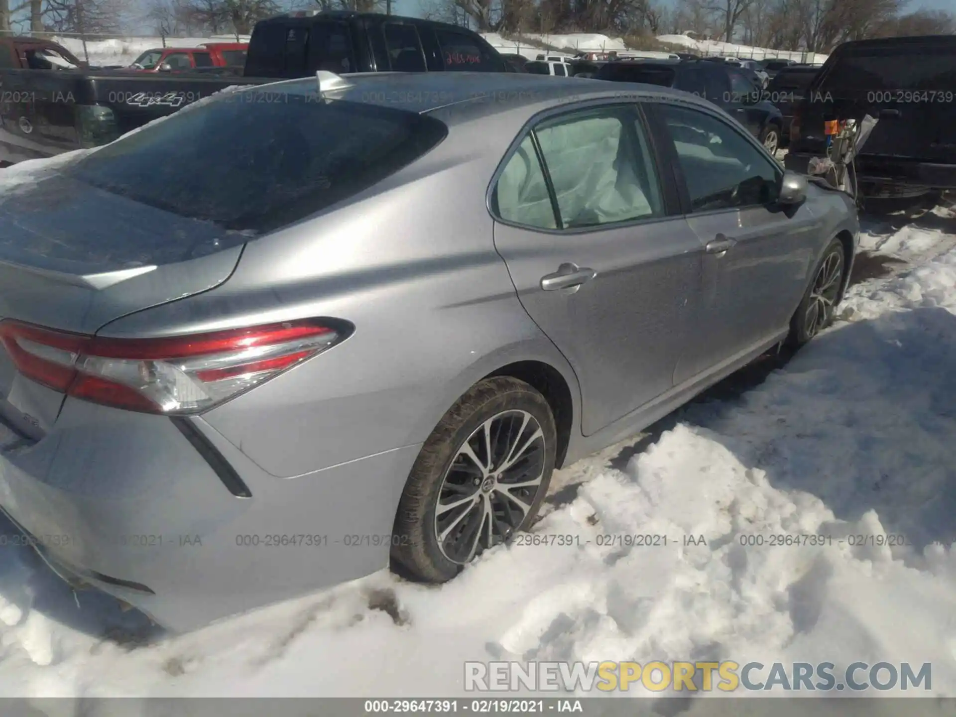 4 Photograph of a damaged car 4T1B11HK3KU687998 TOYOTA CAMRY 2019