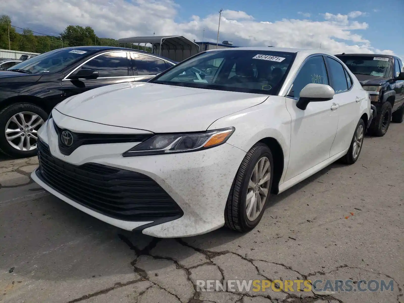 2 Photograph of a damaged car 4T1B11HK3KU688715 TOYOTA CAMRY 2019