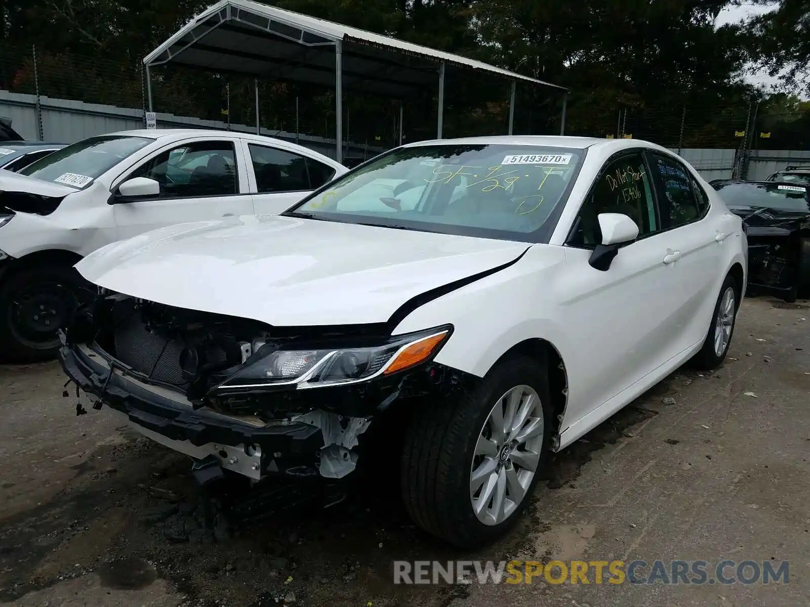 2 Photograph of a damaged car 4T1B11HK3KU689671 TOYOTA CAMRY 2019