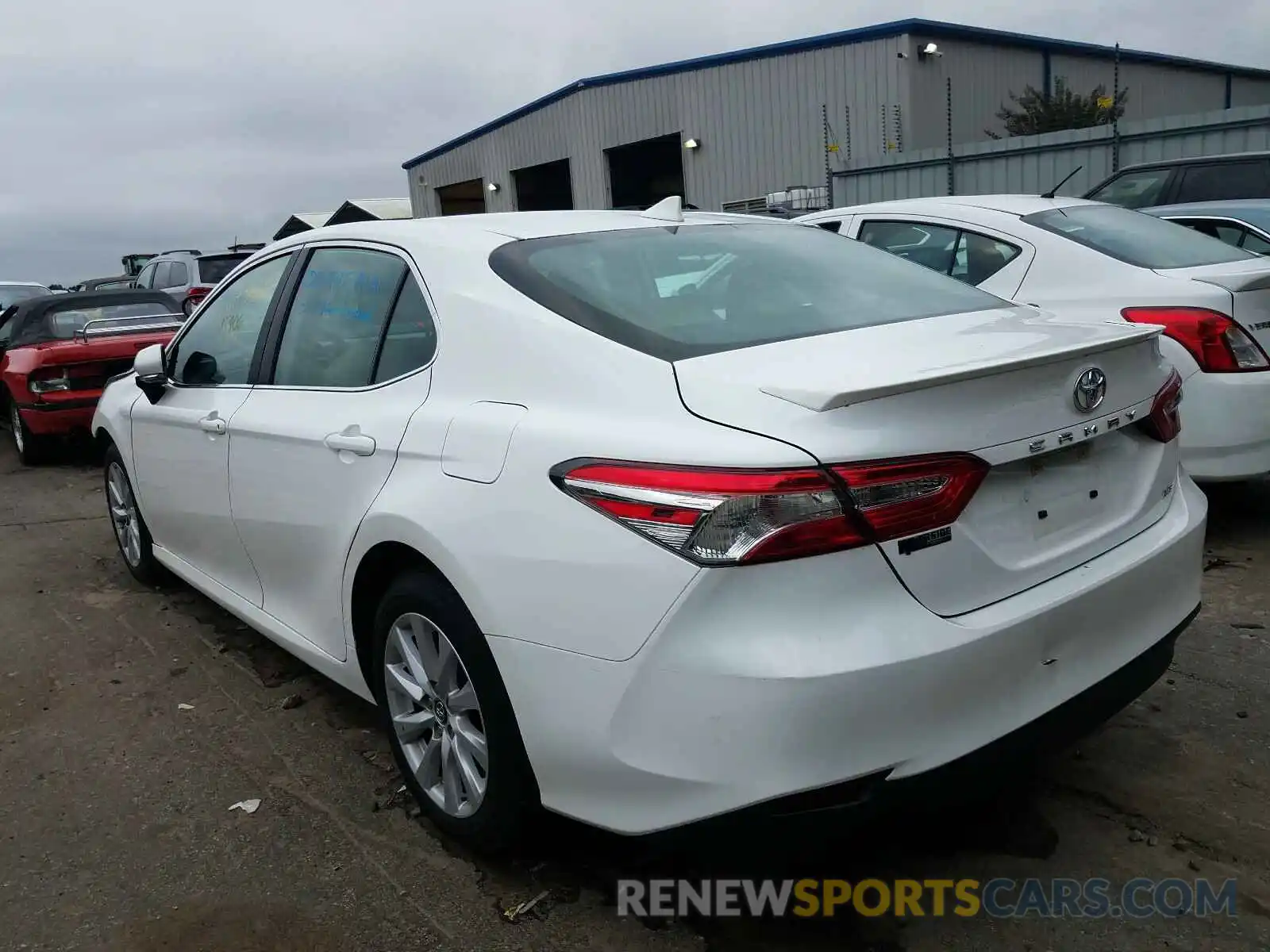 3 Photograph of a damaged car 4T1B11HK3KU689671 TOYOTA CAMRY 2019