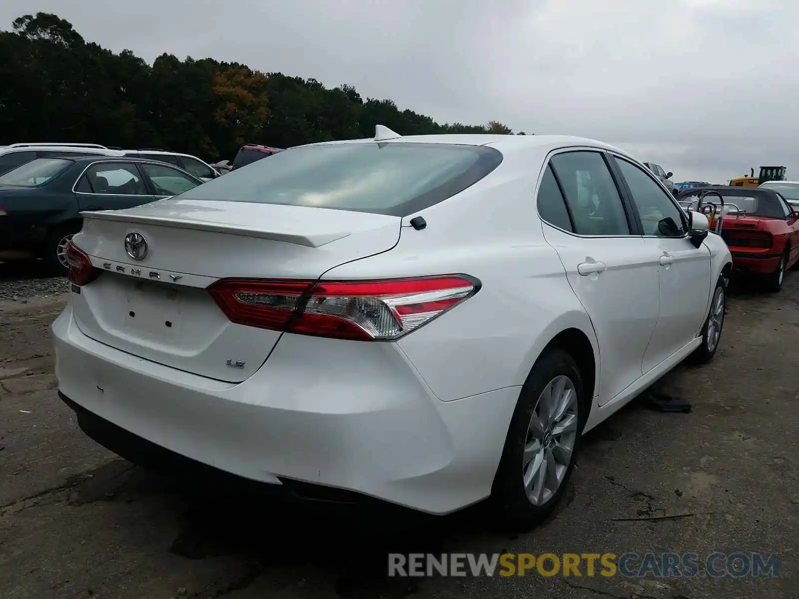 4 Photograph of a damaged car 4T1B11HK3KU689671 TOYOTA CAMRY 2019