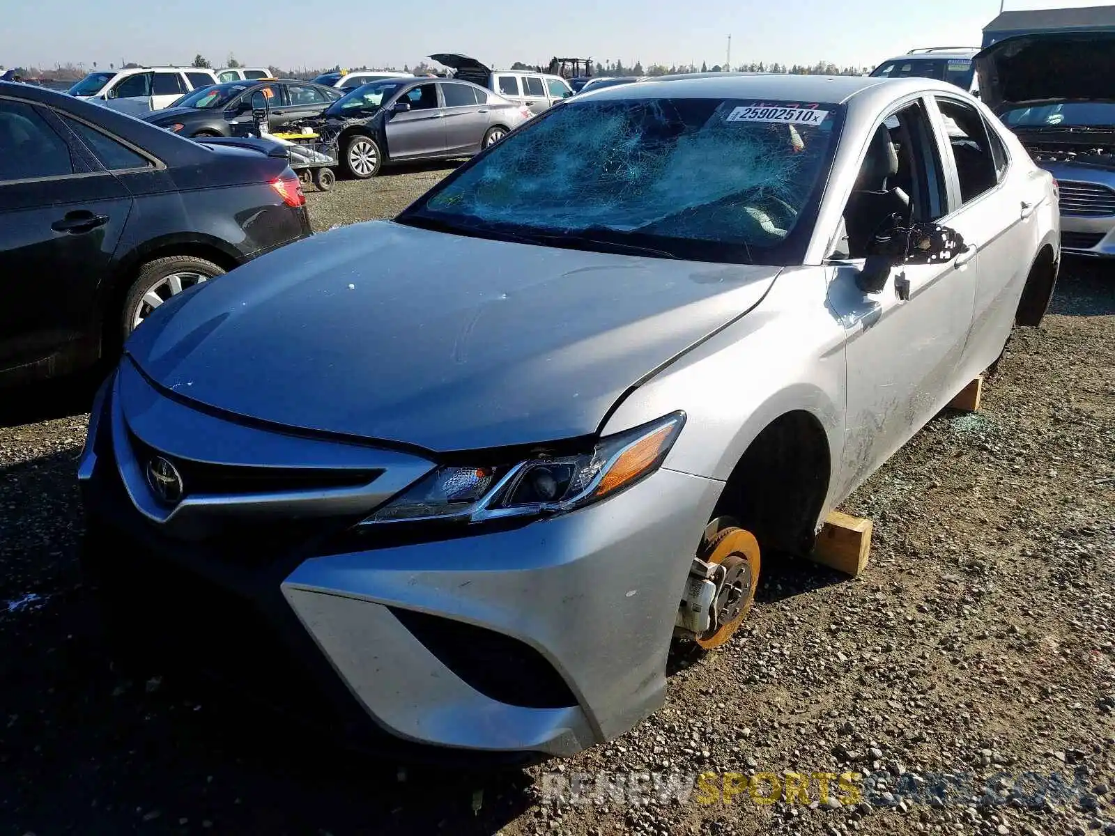 2 Photograph of a damaged car 4T1B11HK3KU689735 TOYOTA CAMRY 2019