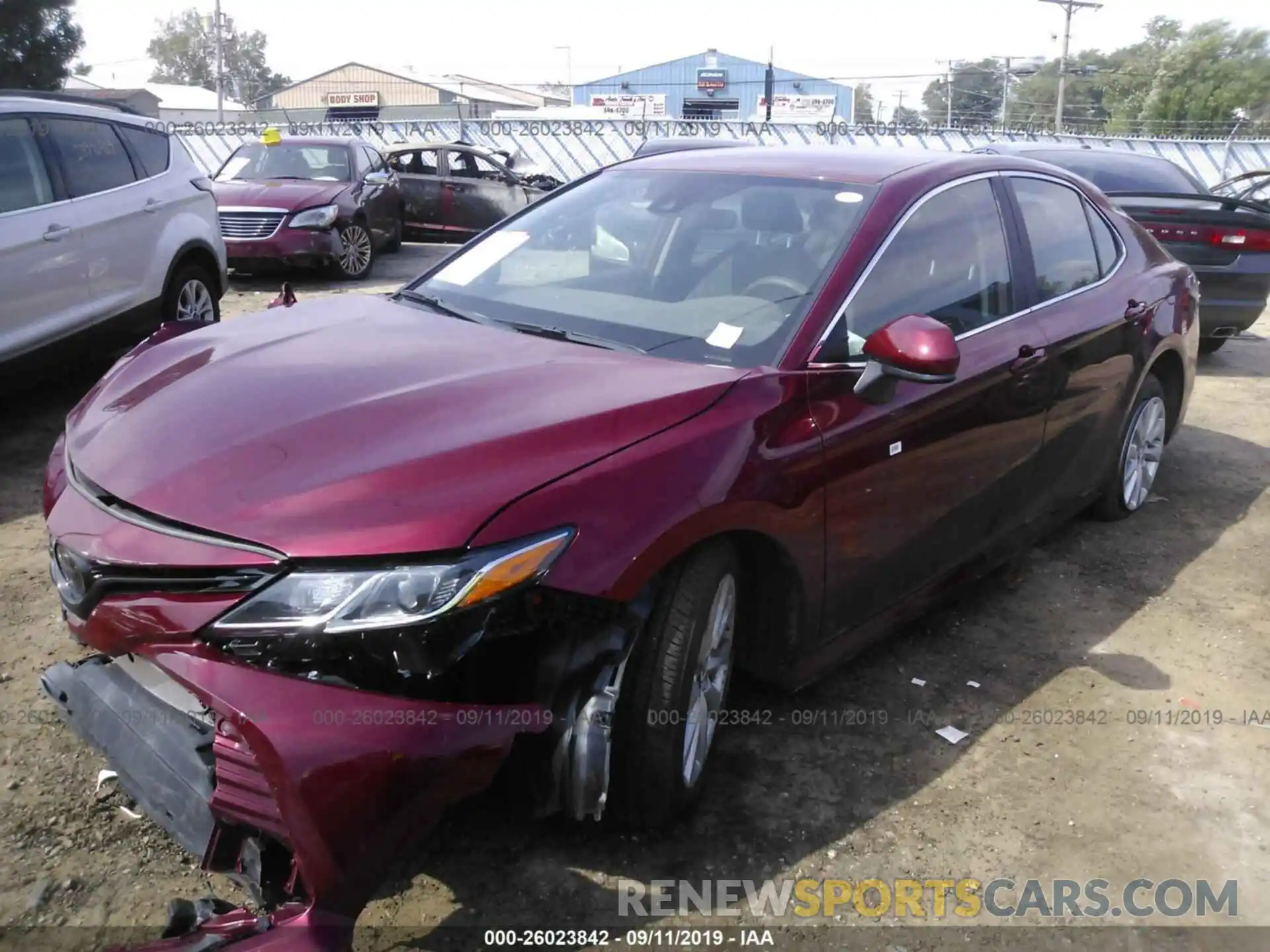 2 Photograph of a damaged car 4T1B11HK3KU690559 TOYOTA CAMRY 2019