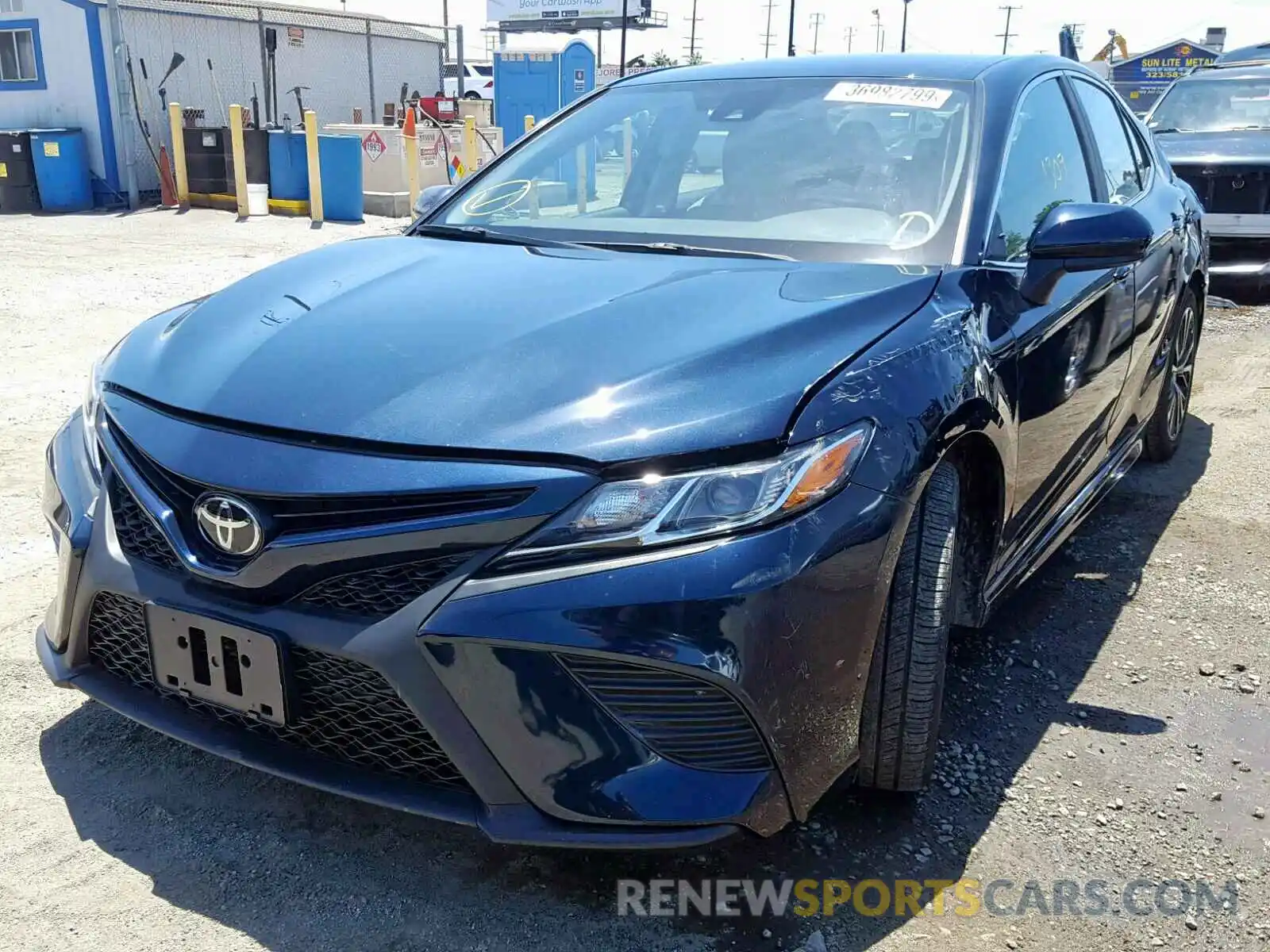 2 Photograph of a damaged car 4T1B11HK3KU690593 TOYOTA CAMRY 2019