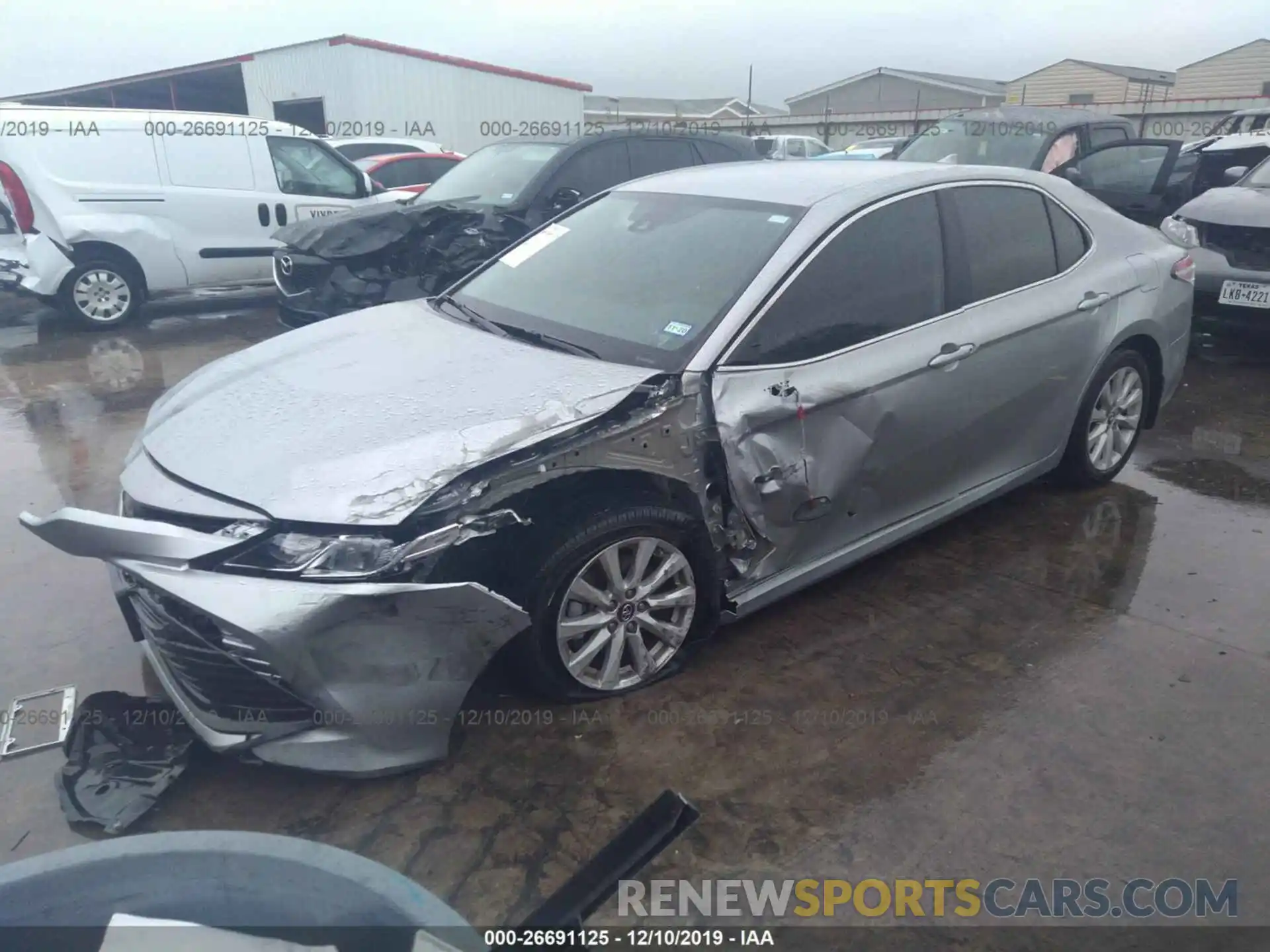 2 Photograph of a damaged car 4T1B11HK3KU691694 TOYOTA CAMRY 2019