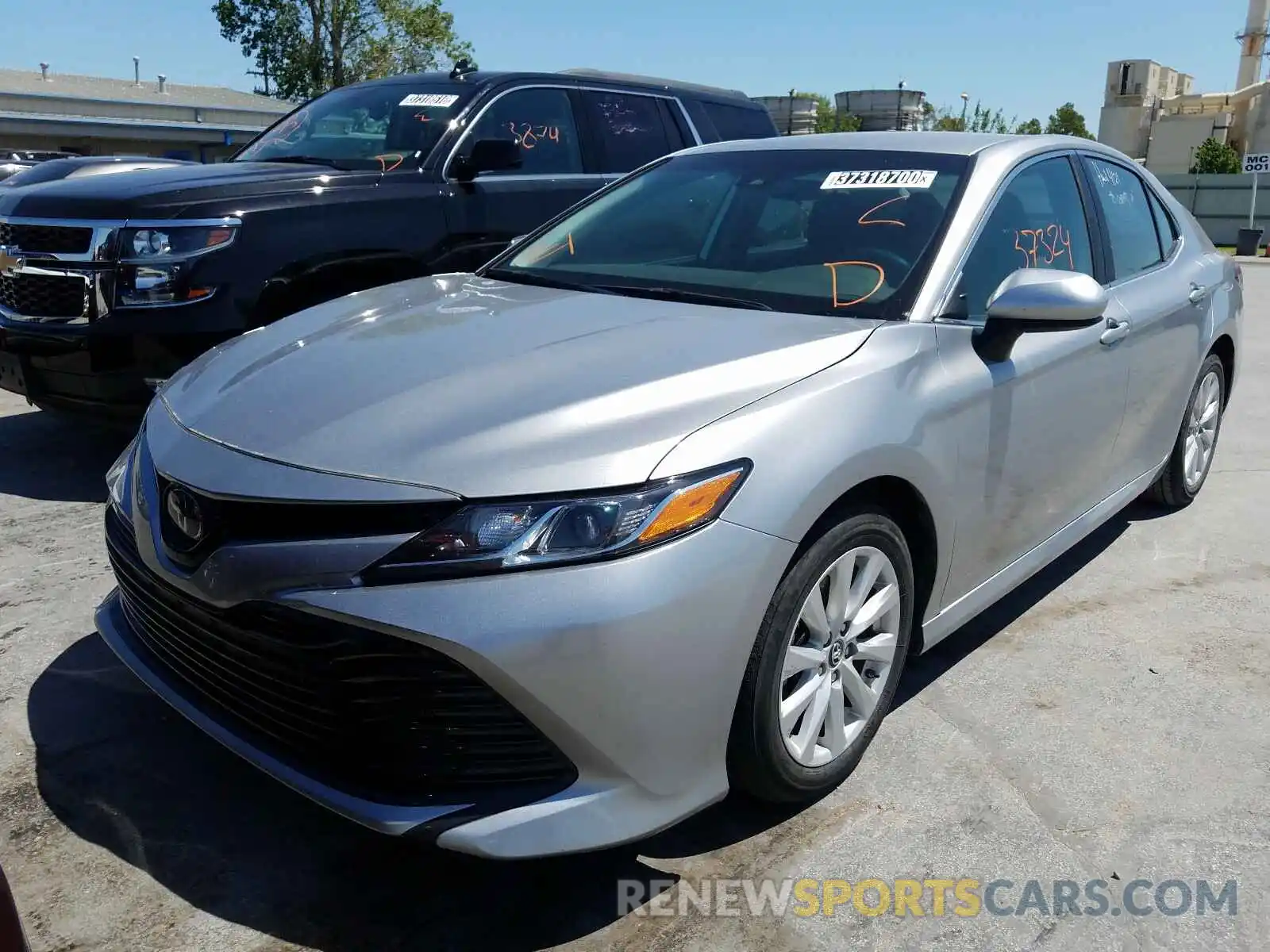 2 Photograph of a damaged car 4T1B11HK3KU691923 TOYOTA CAMRY 2019