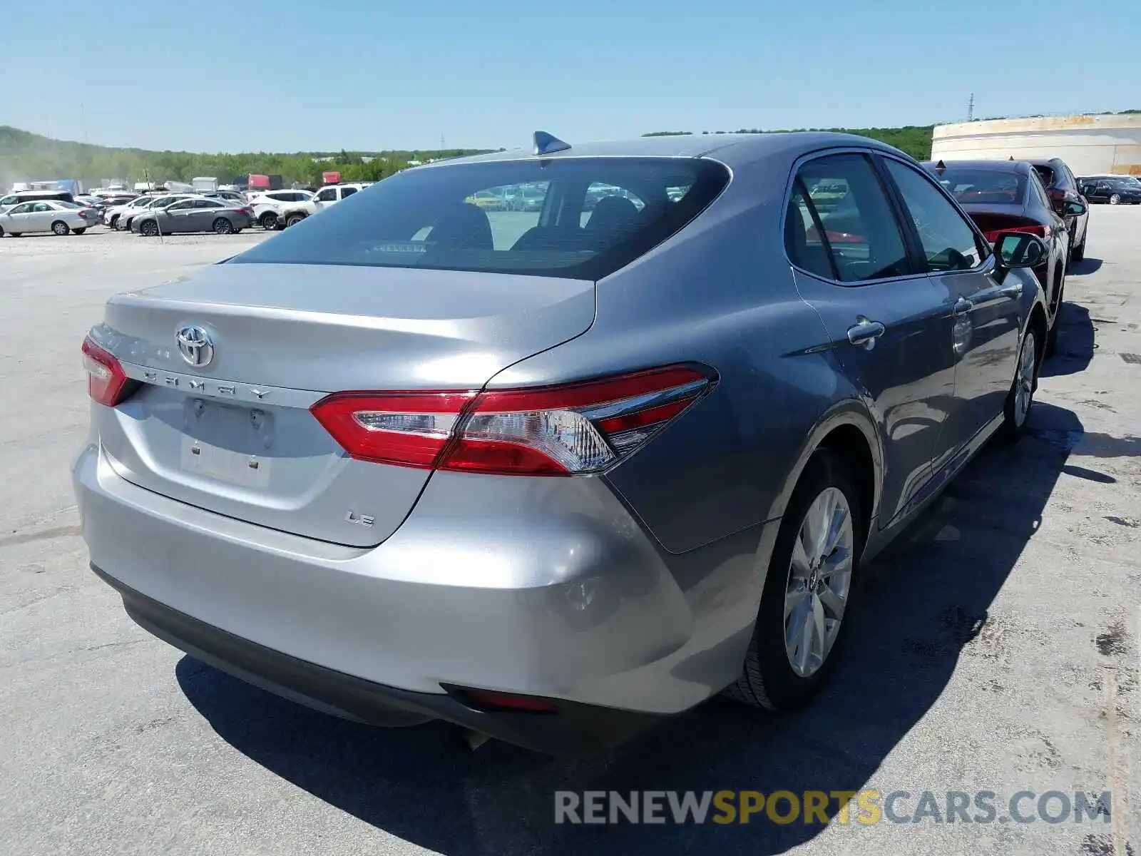 4 Photograph of a damaged car 4T1B11HK3KU691923 TOYOTA CAMRY 2019