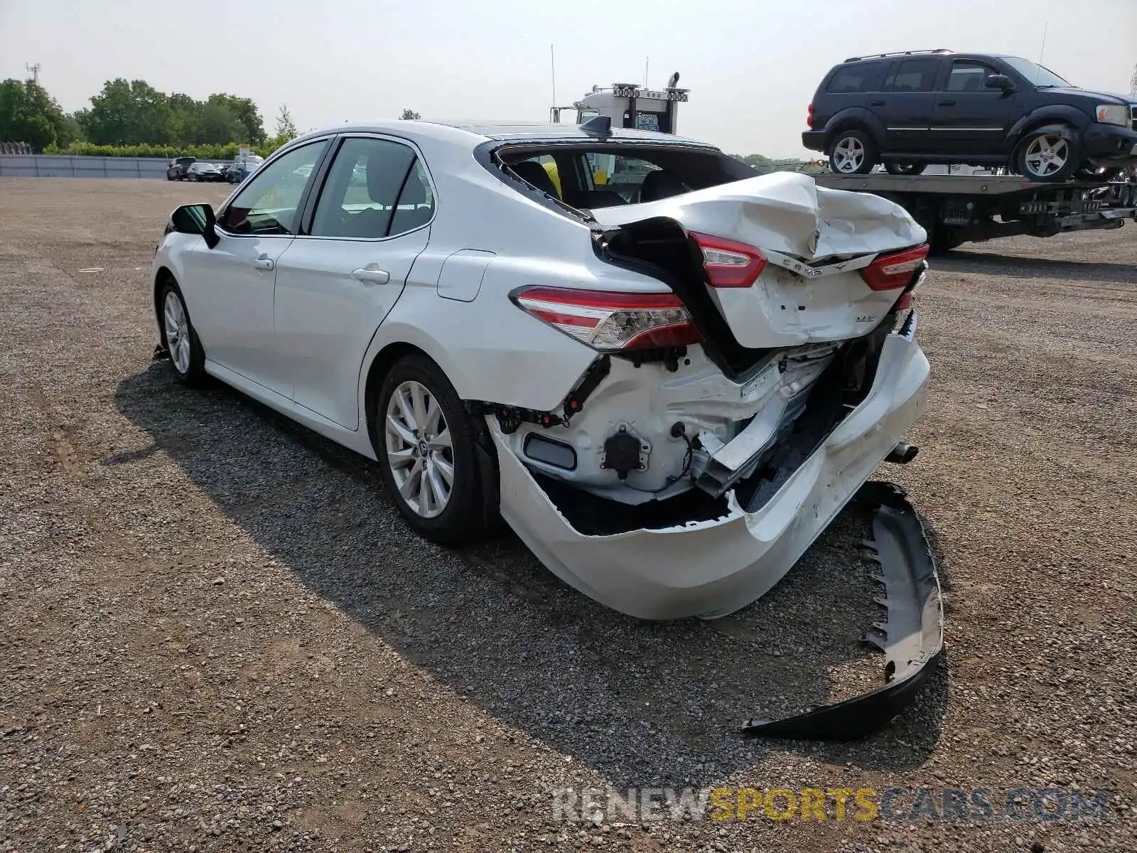 3 Photograph of a damaged car 4T1B11HK3KU693140 TOYOTA CAMRY 2019