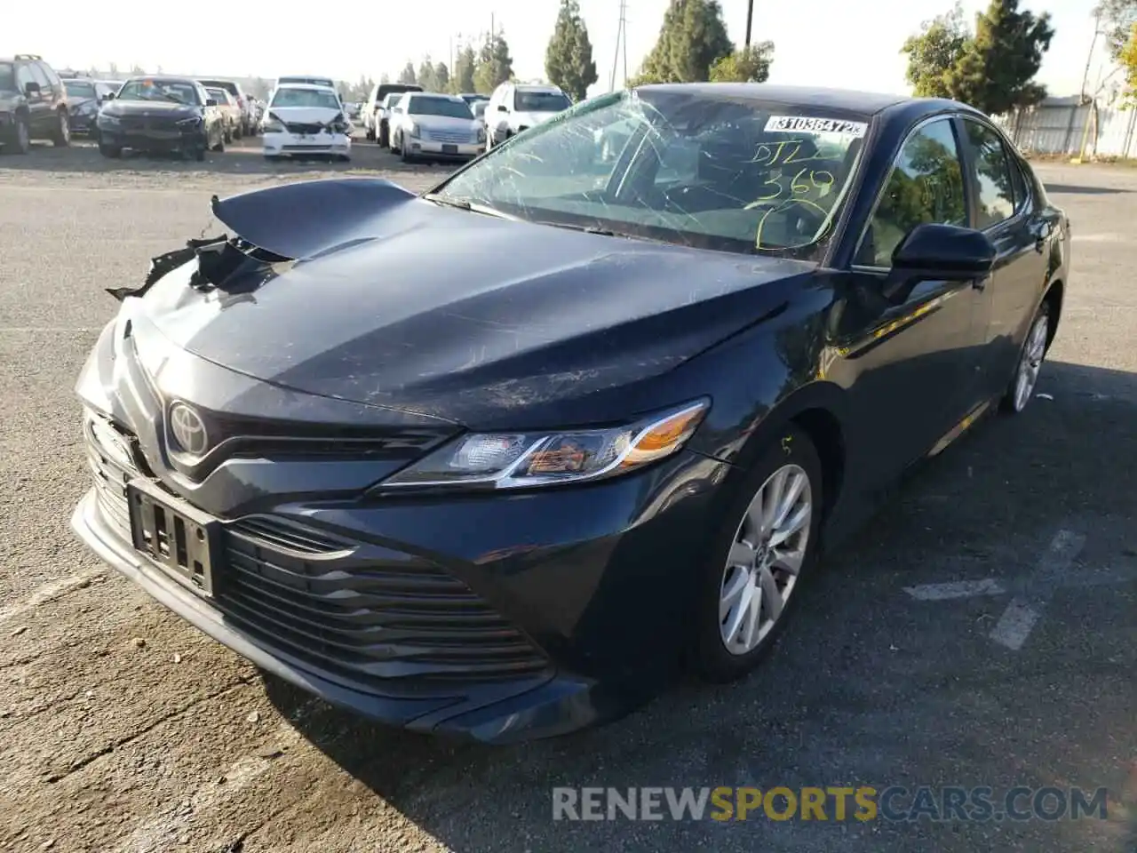 2 Photograph of a damaged car 4T1B11HK3KU693655 TOYOTA CAMRY 2019