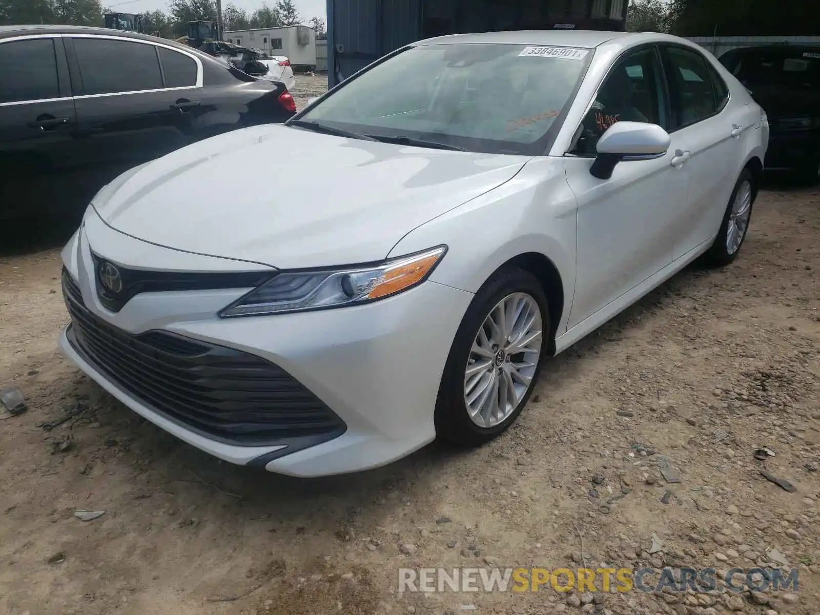 2 Photograph of a damaged car 4T1B11HK3KU694000 TOYOTA CAMRY 2019